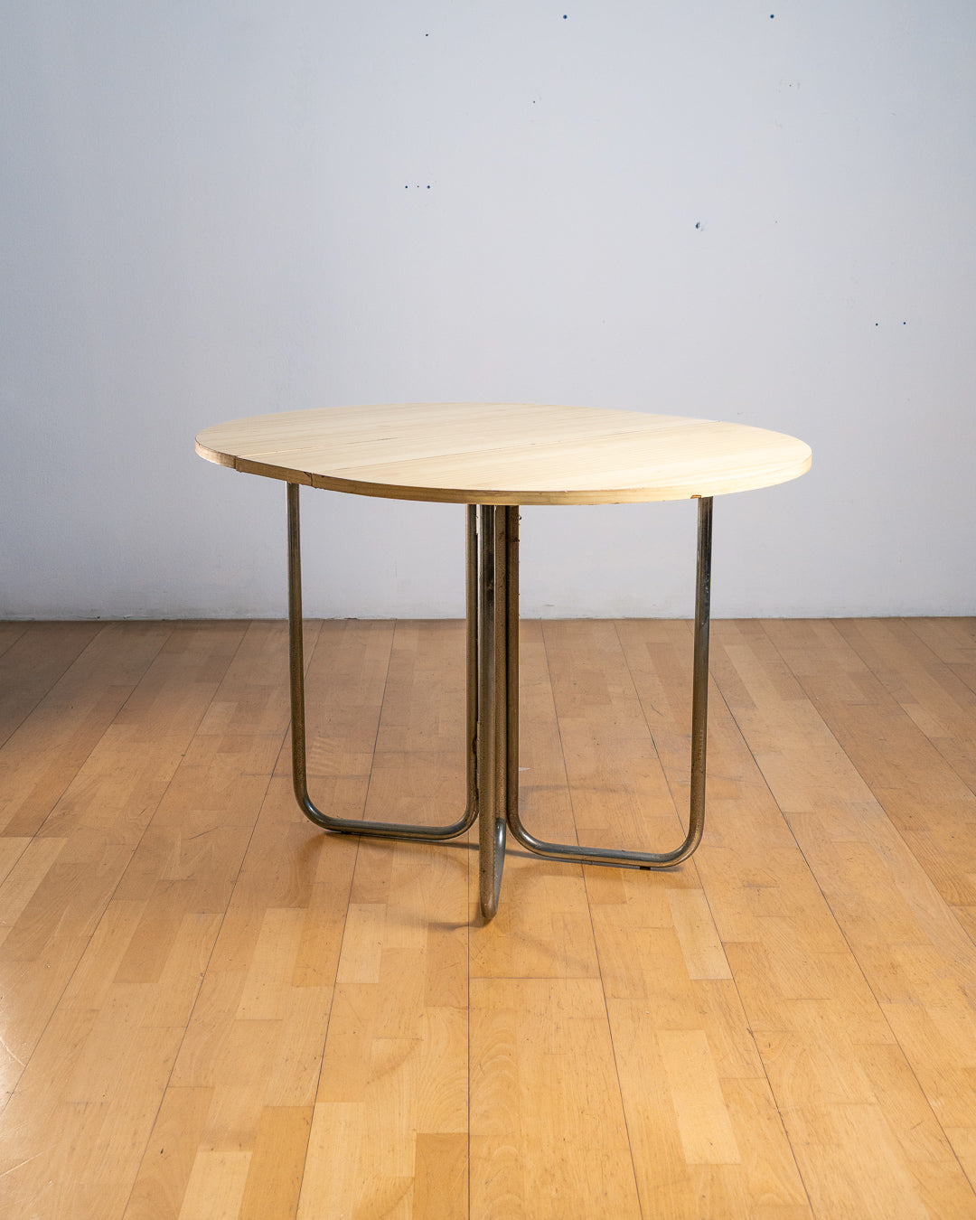 Vintage 1970s folding space-saving dining table with chrome tubular legs and a customizable Formica tabletop. Space Age style. Vecino Shop
