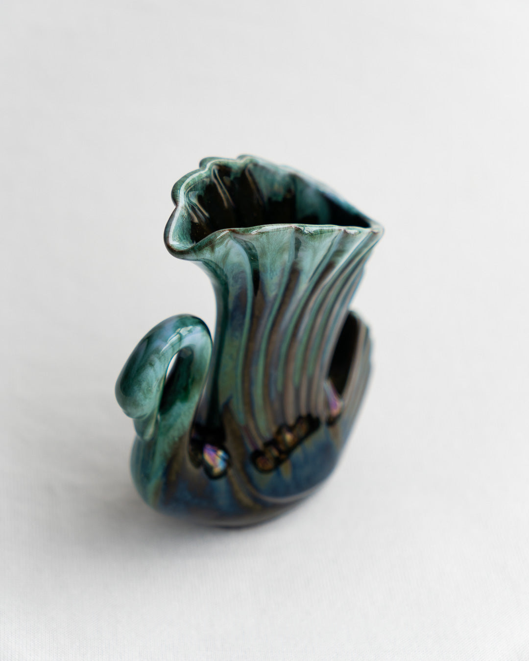 Vintage Blue Mountain Pottery swan-shaped vase with signature blue-green glaze and elegant mid-century modern curves, made in Canada - Vecino Shop