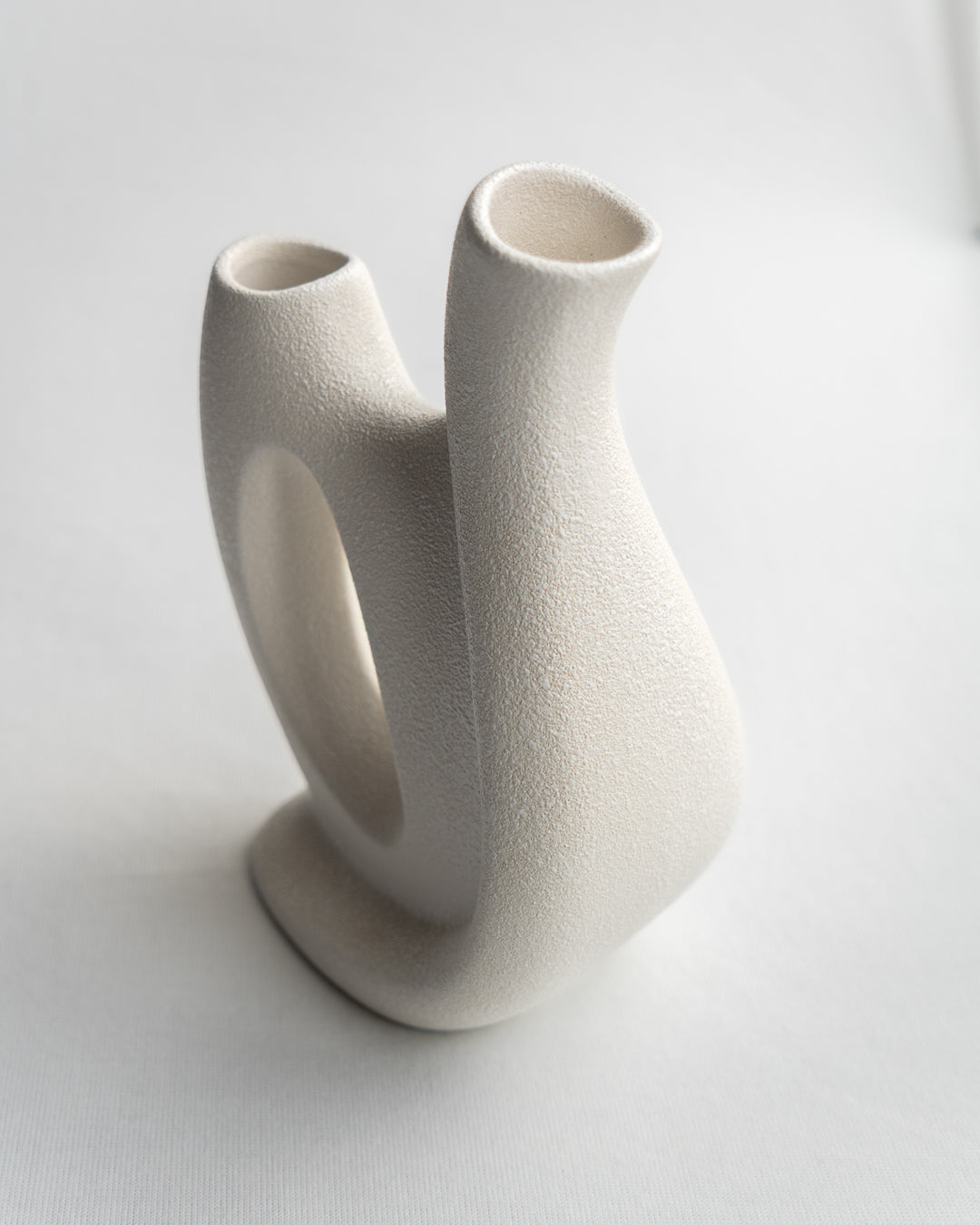 Vintage Italian double vase by Bertoncello with sculptural mid-century design, minimalist form, and textured ceramic glaze - Vecino Shop