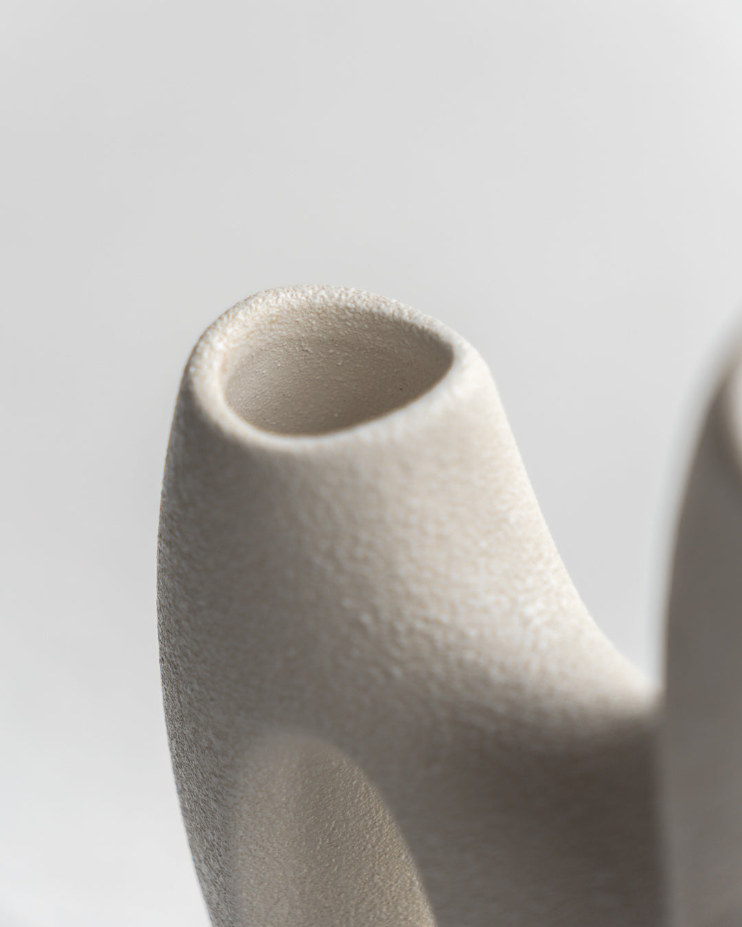 Vintage Italian double vase by Bertoncello with sculptural mid-century design, minimalist form, and textured ceramic glaze - Vecino Shop