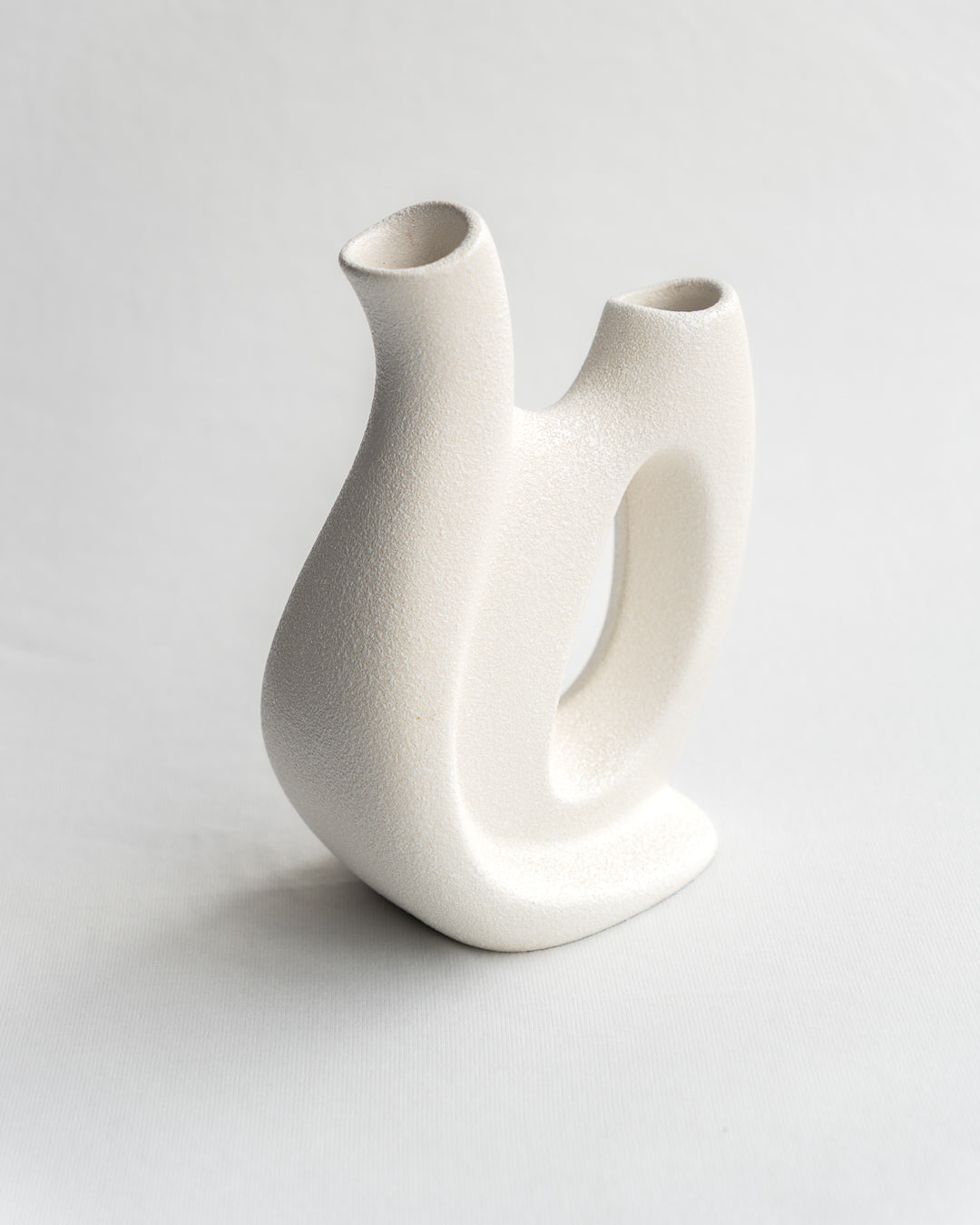 Vintage Italian double vase by Bertoncello with sculptural mid-century design, minimalist form, and textured ceramic glaze - Vecino Shop