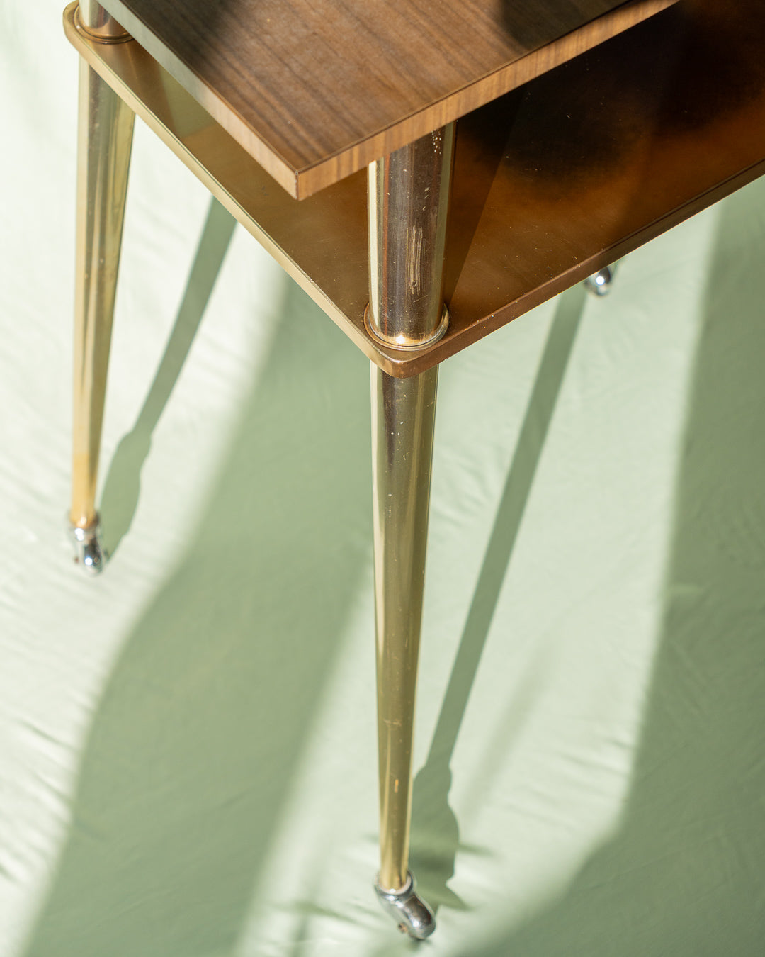 Vintage Scandinavian side table with tapered legs and clean lines. A Mid-Century Modern gem from the 1960s. Warm wood tone and minimalist elegance - Vecino Shop