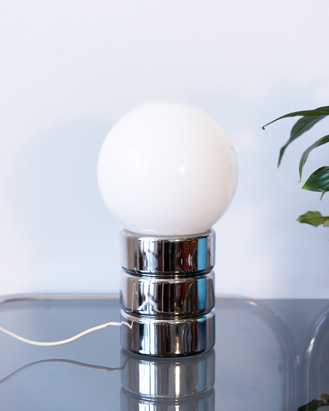 Vintage Space Age table lamp with chrome cylindrical base and white opaline shade – Vecino Shop