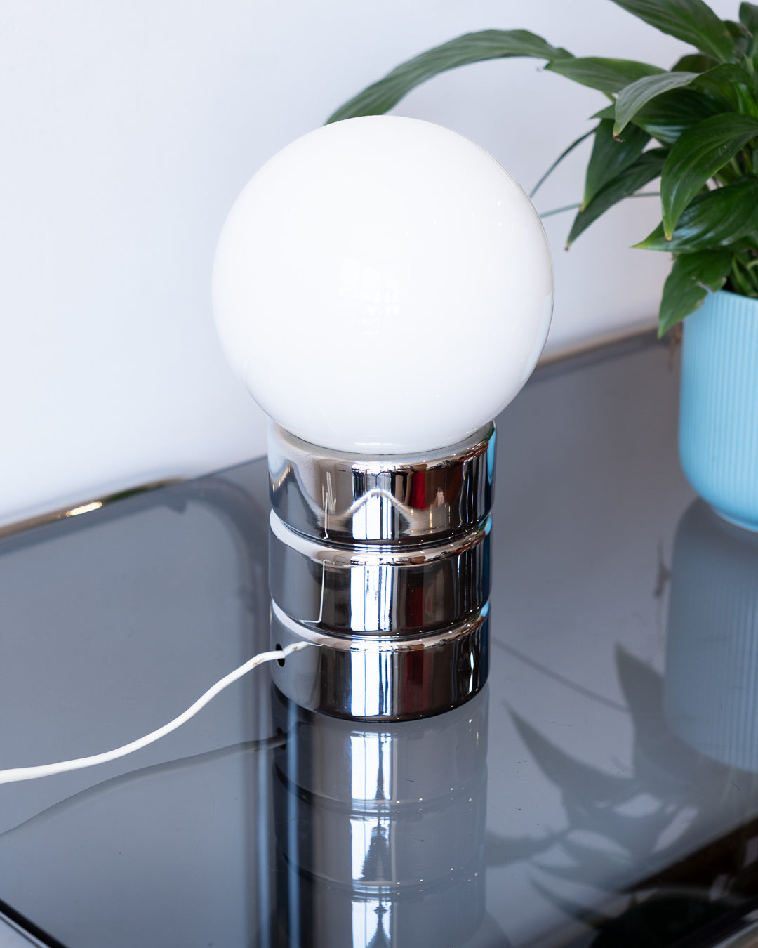 Vintage Space Age table lamp with chrome cylindrical base and white opaline shade – Vecino Shop
