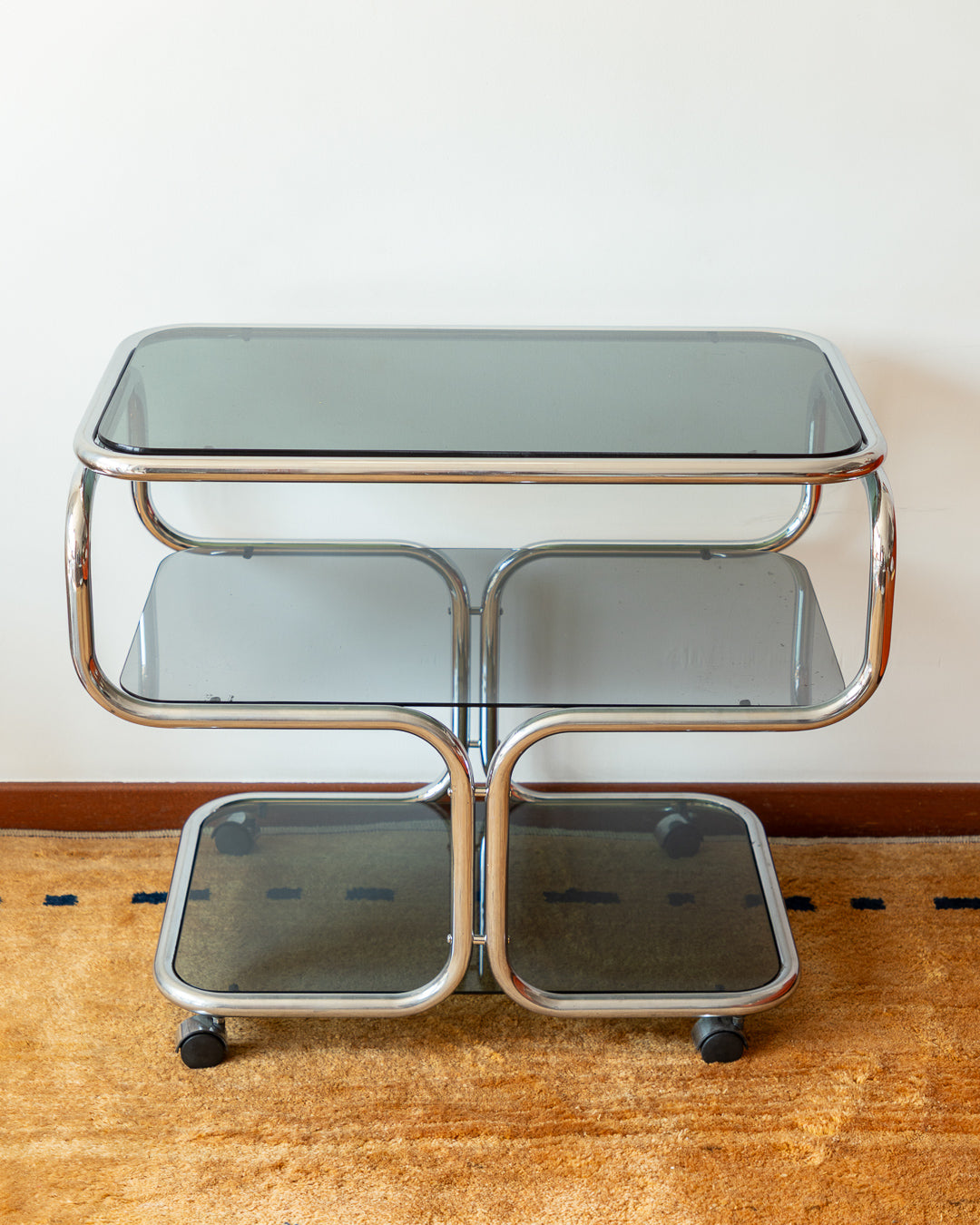 Vintage 1970s 3-tier chrome side table with smoked glass shelves – restored piece with signs of age on bottom tier – Vecino Shop