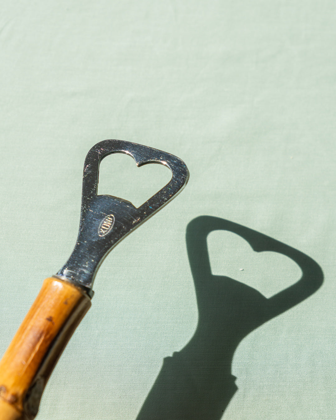 Vintage 1970s bamboo handle bottle opener – polished metal and natural bamboo – Vecino Shop