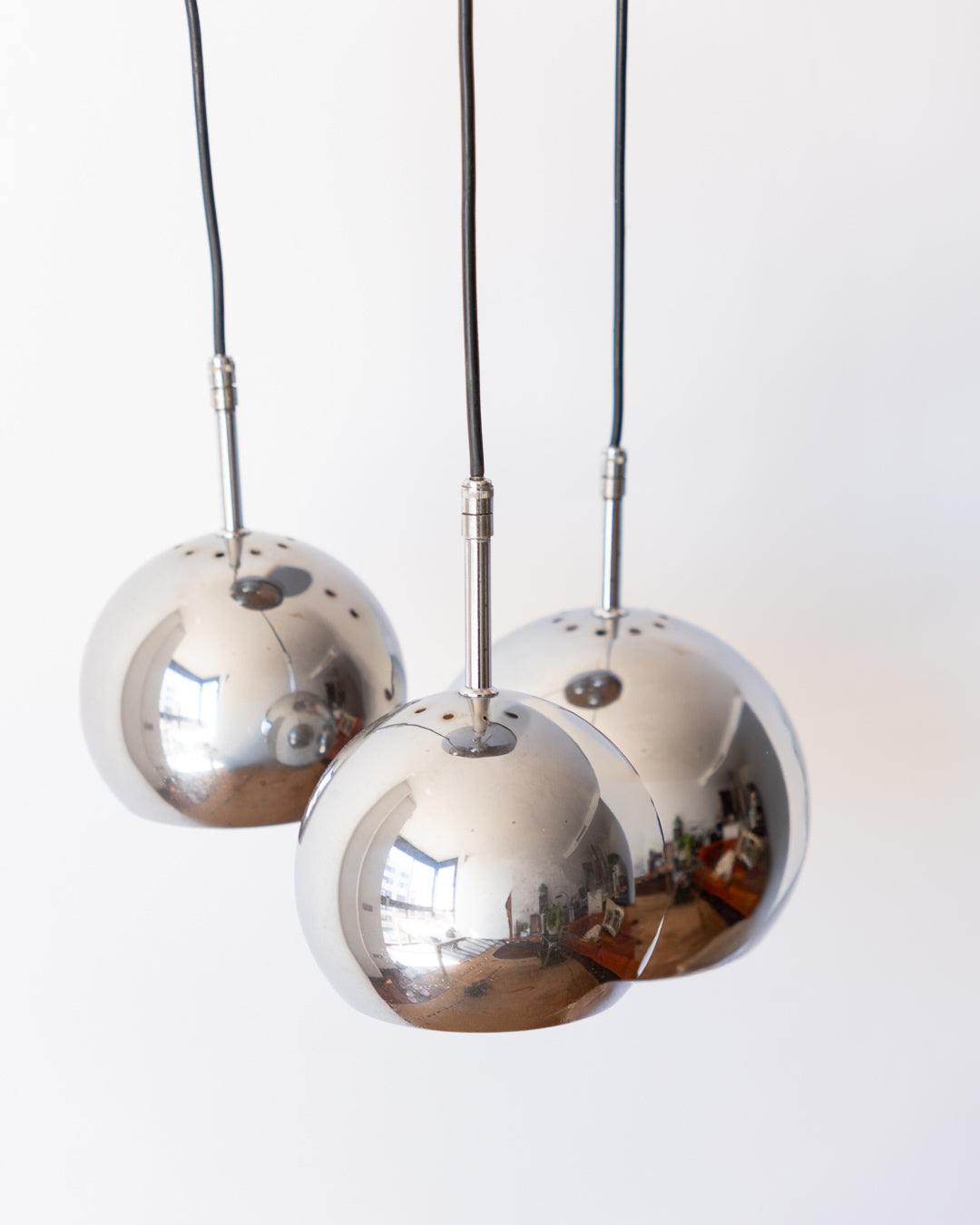 Vintage 3-eyeball chrome pendant light, mid-century design, good condition, minor visible details | Vecino Shop
