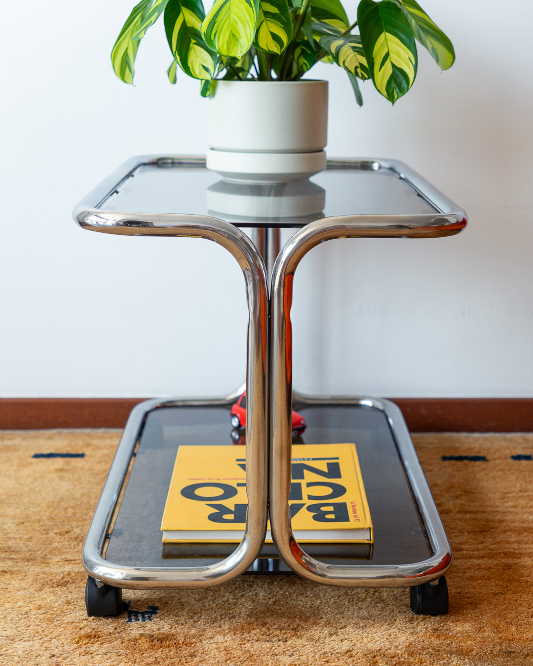 Vintage 1970s chrome side table with two smoked glass shelves – Vecino Shop