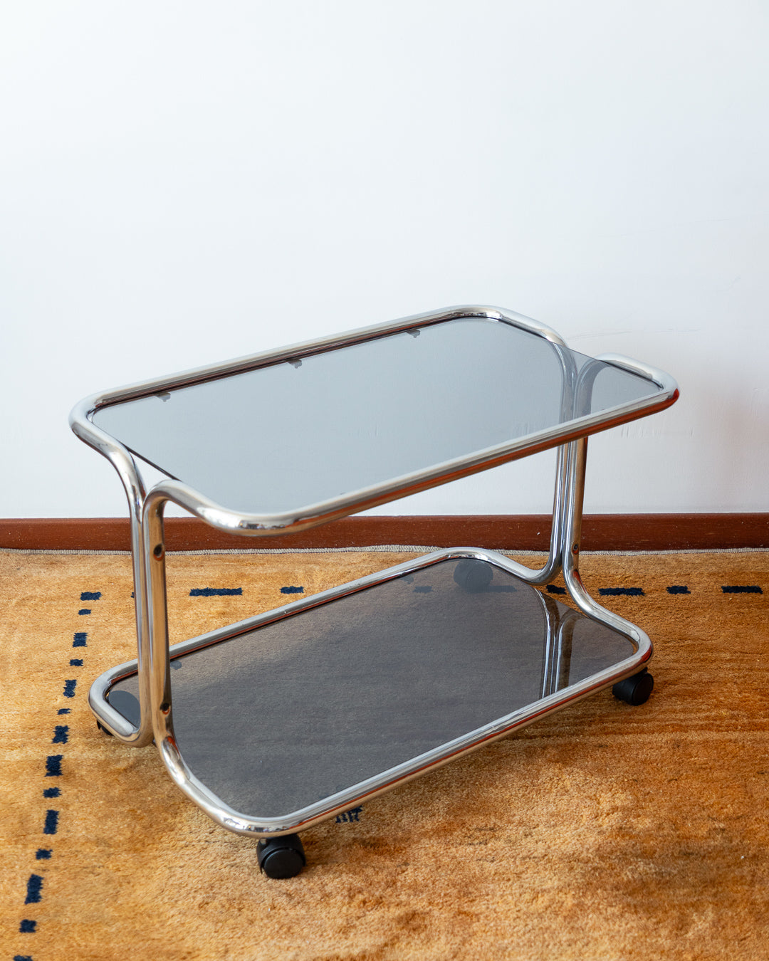 Vintage 1970s chrome side table with two smoked glass shelves – Vecino Shop