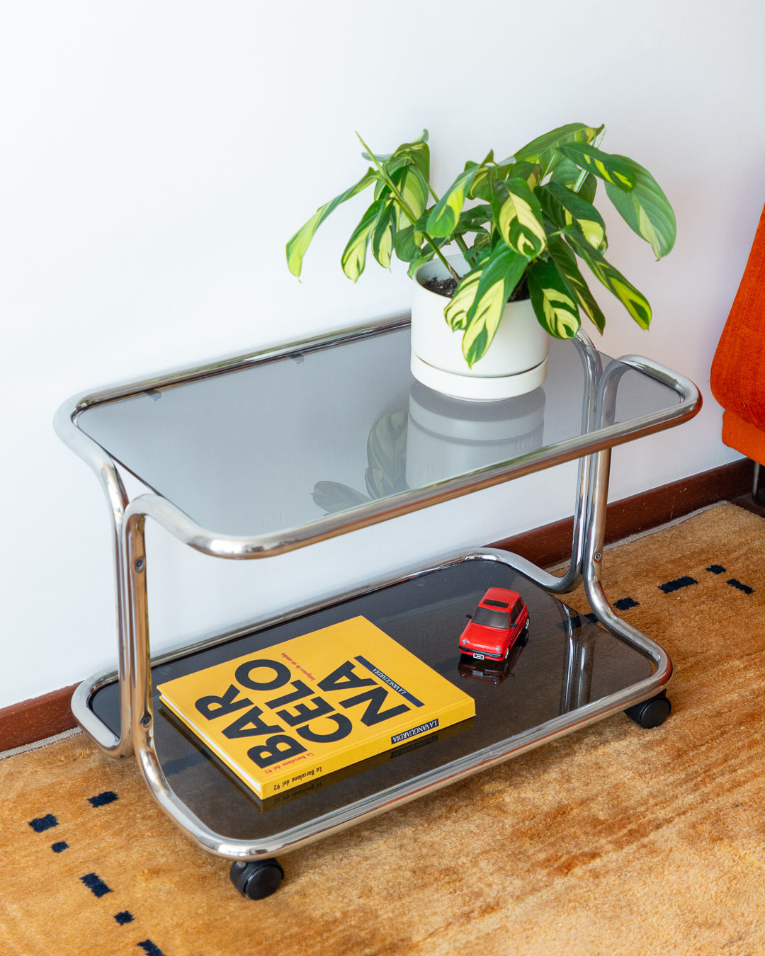 Vintage 1970s chrome side table with two smoked glass shelves – Vecino Shop