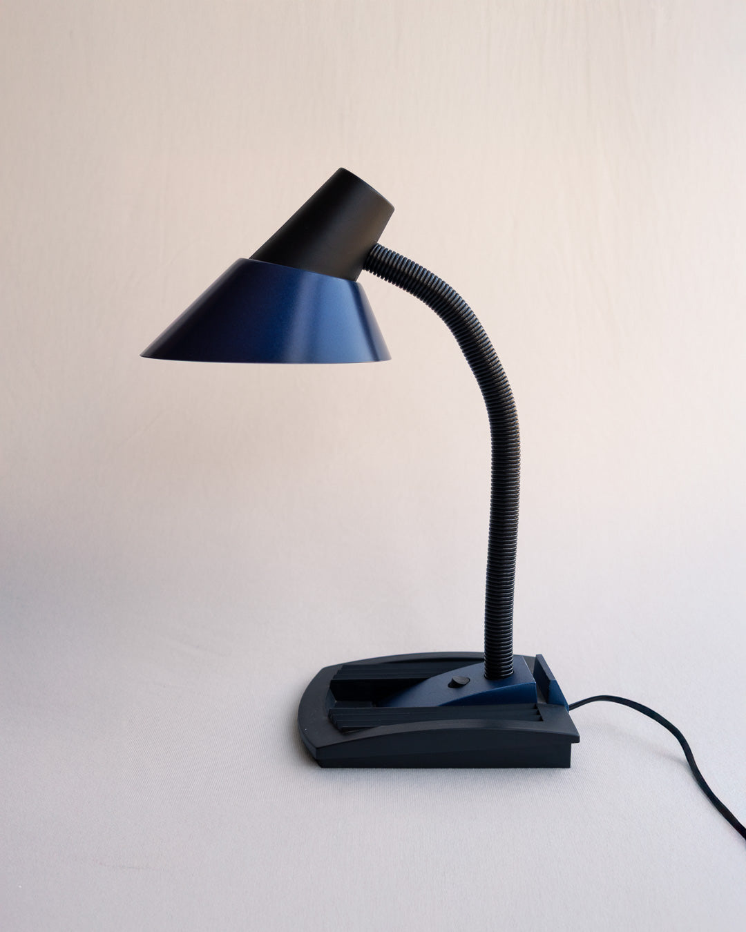 Vintage blue and black desk lamp with flexible neck and built-in organizer, designed by Massive in Belgium, 1980s - Vecino Shop