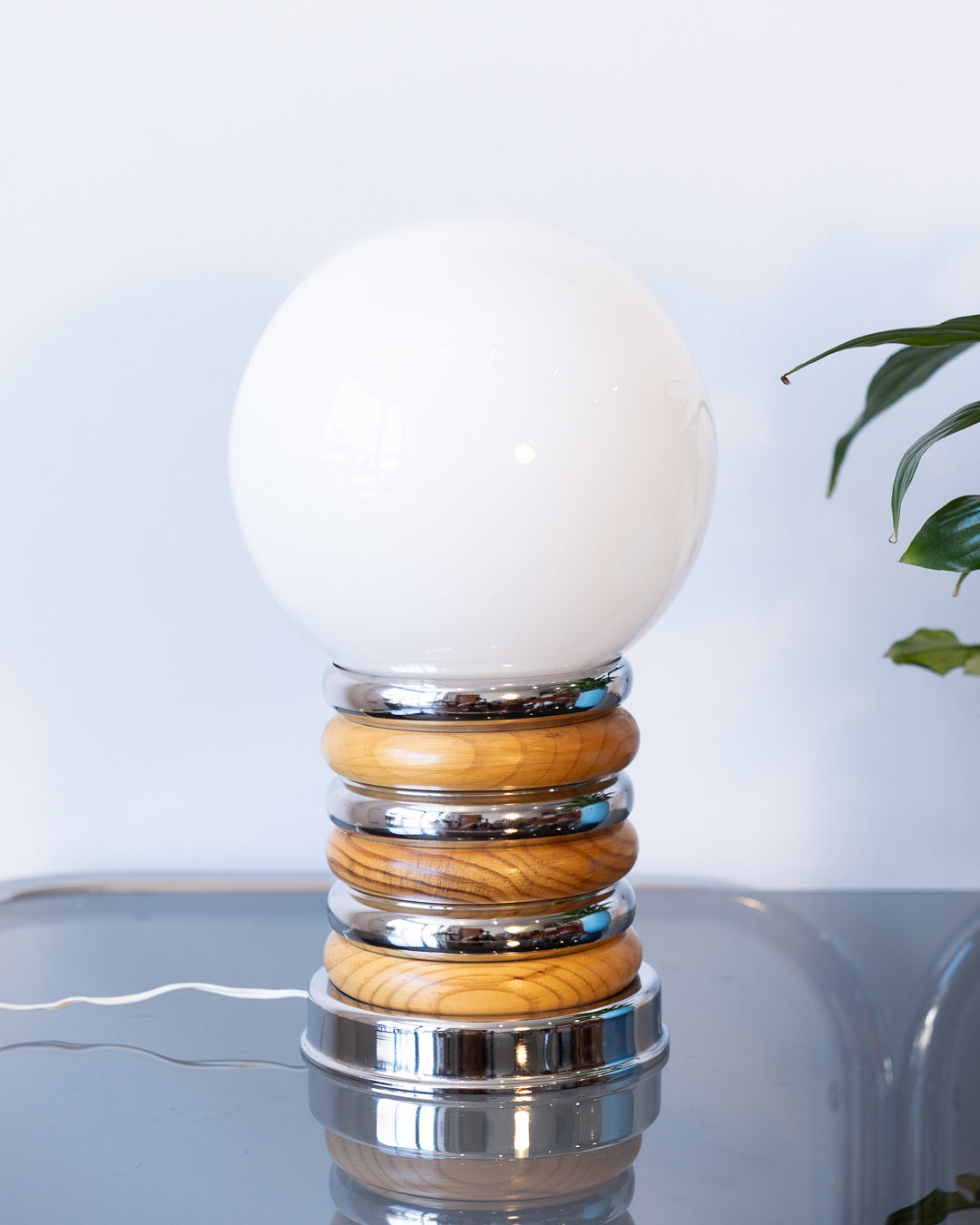Vintage space age table lamp with white opaline shade and stacked chrome and wood ring base – Vecino Shop