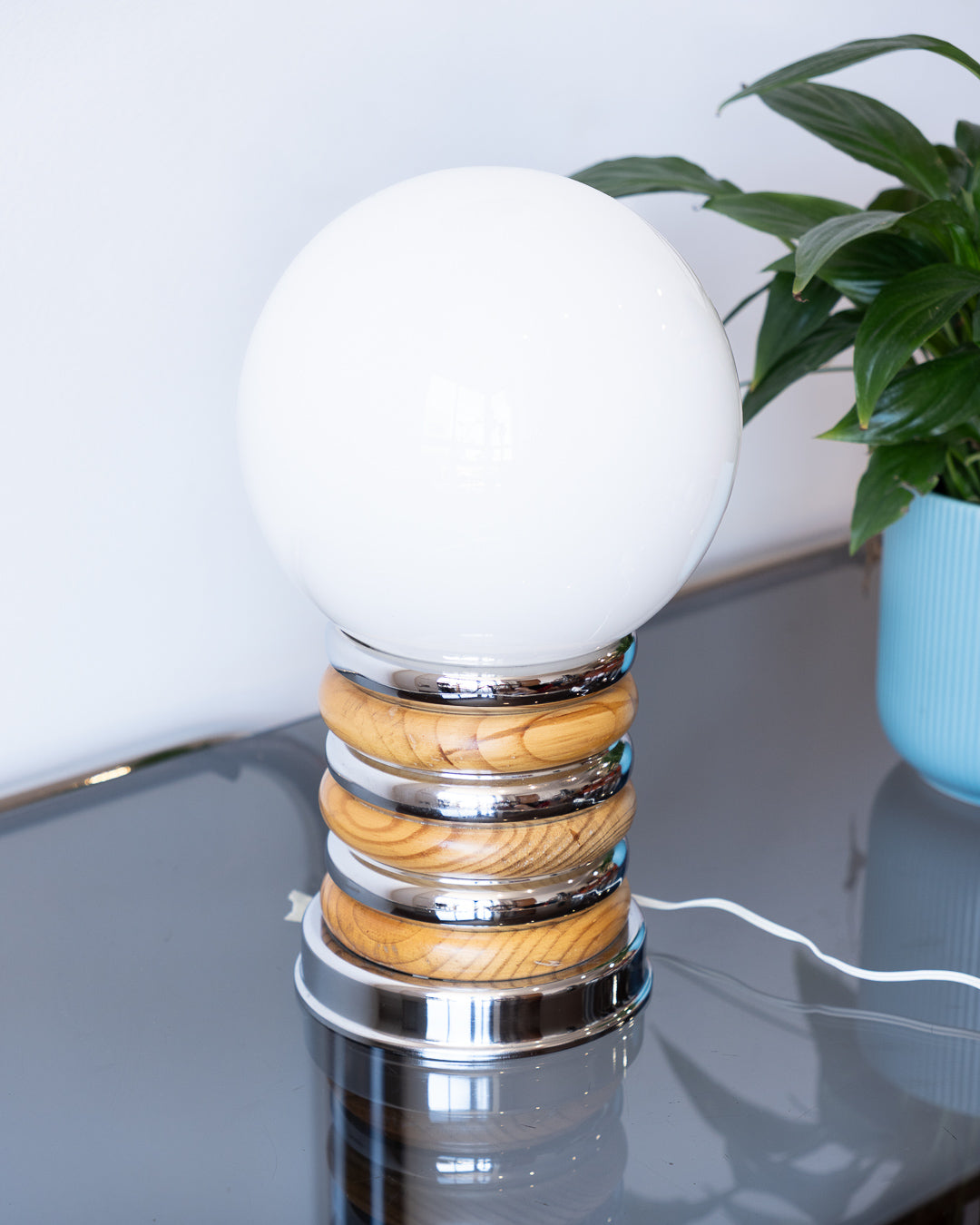 Vintage space age table lamp with white opaline shade and stacked chrome and wood ring base – Vecino Shop