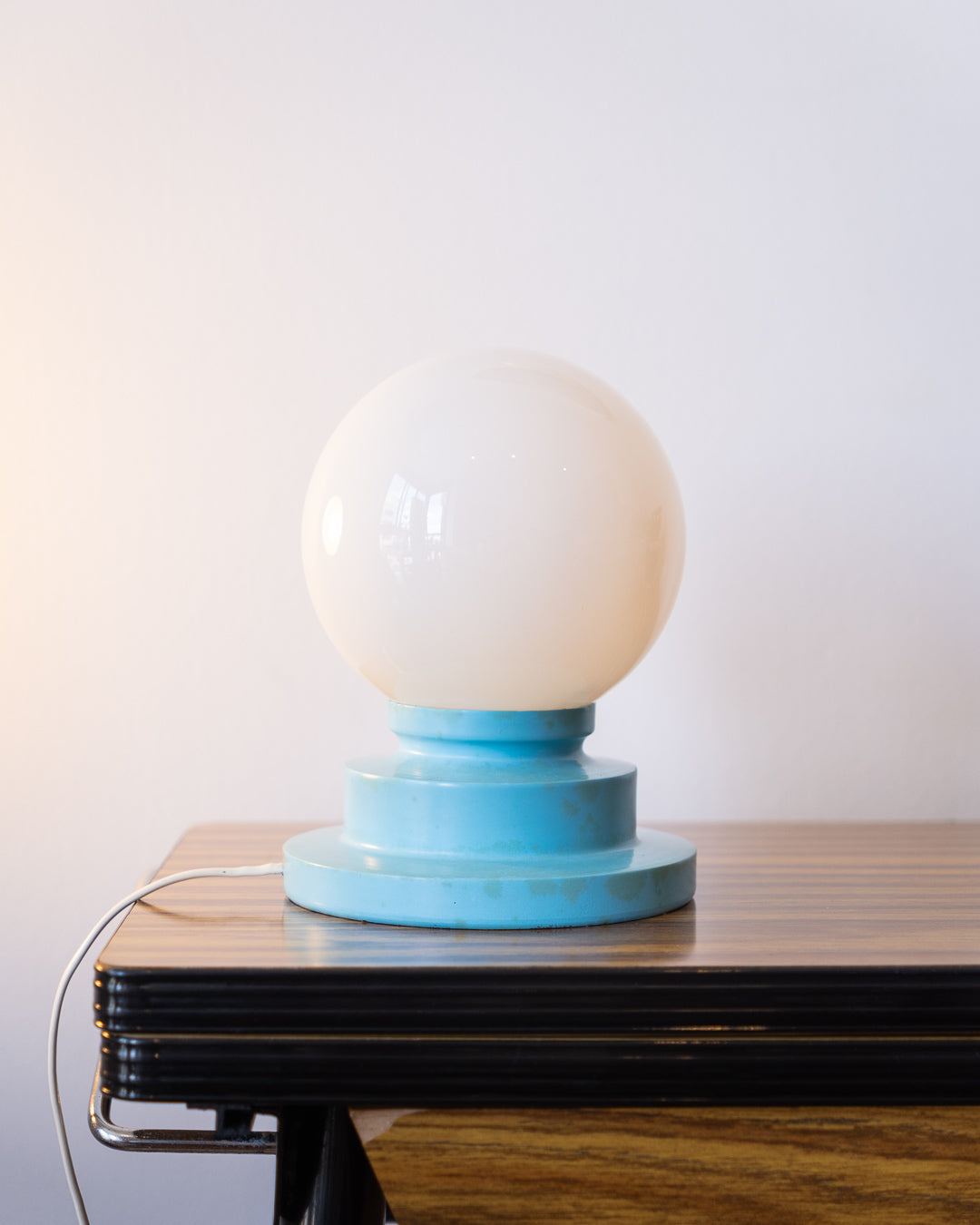 Vintage space age table lamp with white opaline shade and light blue stepped cone base – Vecino Shop