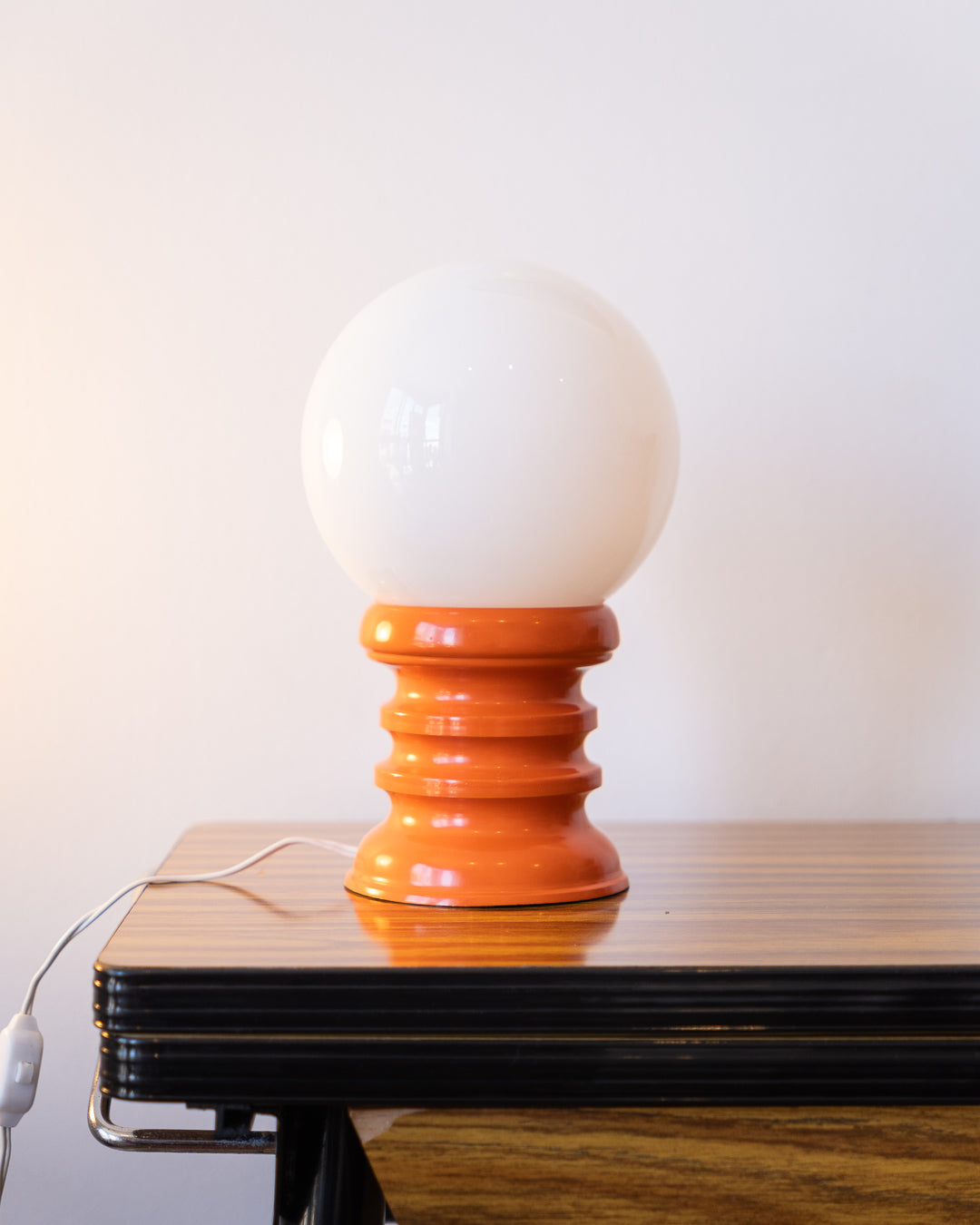 Vintage space age table lamp with white opaline shade and orange tapered sculptural base – Vecino Shop
