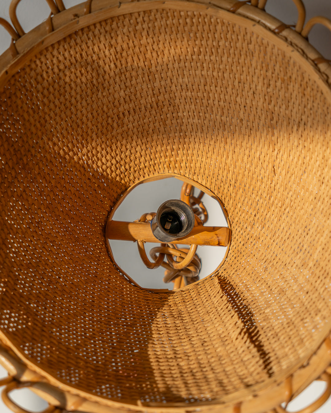 Vintage 1960s handwoven wicker ceiling lamp with natural texture and boho style. A warm, organic statement light for living rooms, bedrooms, or studios.