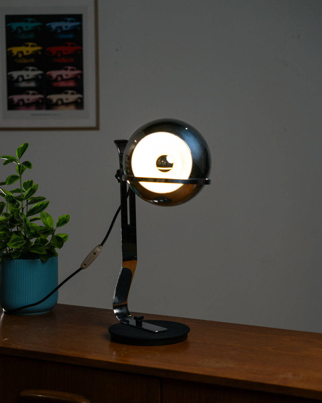 Vintage 1970s chrome floating eyeball desk lamp with sculptural base and adjustable spotlight. Vecino Shop