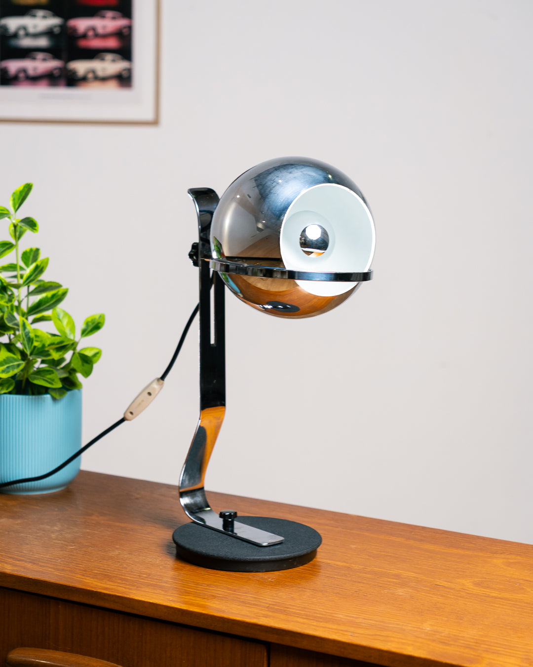 Vintage 1970s chrome floating eyeball desk lamp with sculptural base and adjustable spotlight. Vecino Shop