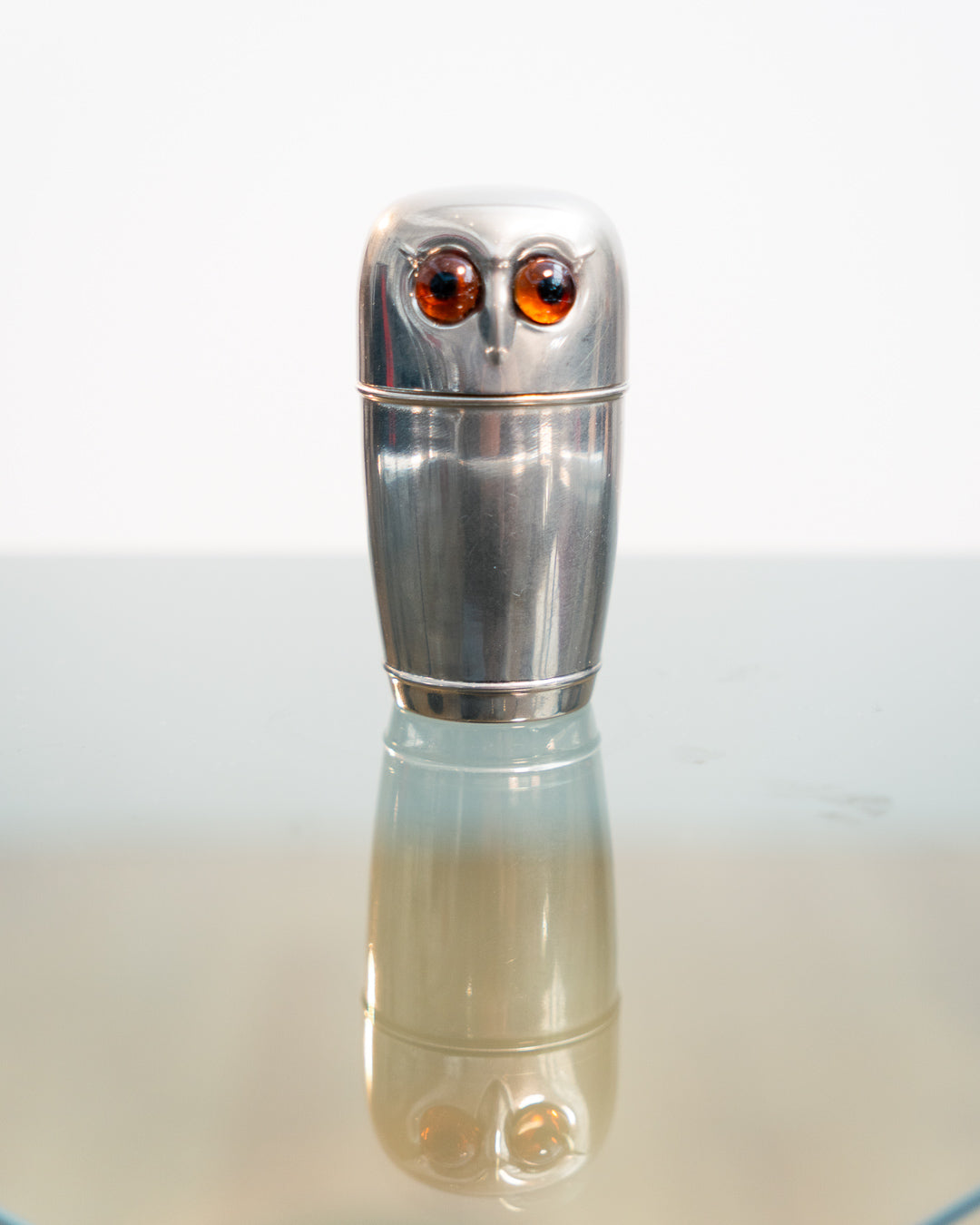 Vintage 1960s owl nesting shot glass set from West Germany with chrome body, amber eyes. Vecino Shop