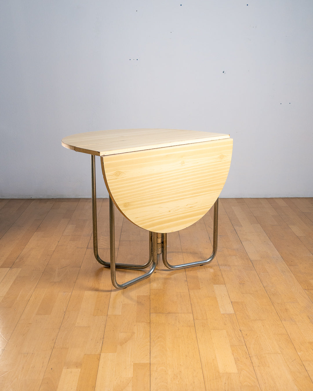 Vintage 1970s folding space-saving dining table with chrome tubular legs and a customizable Formica tabletop. Space Age style. Vecino Shop