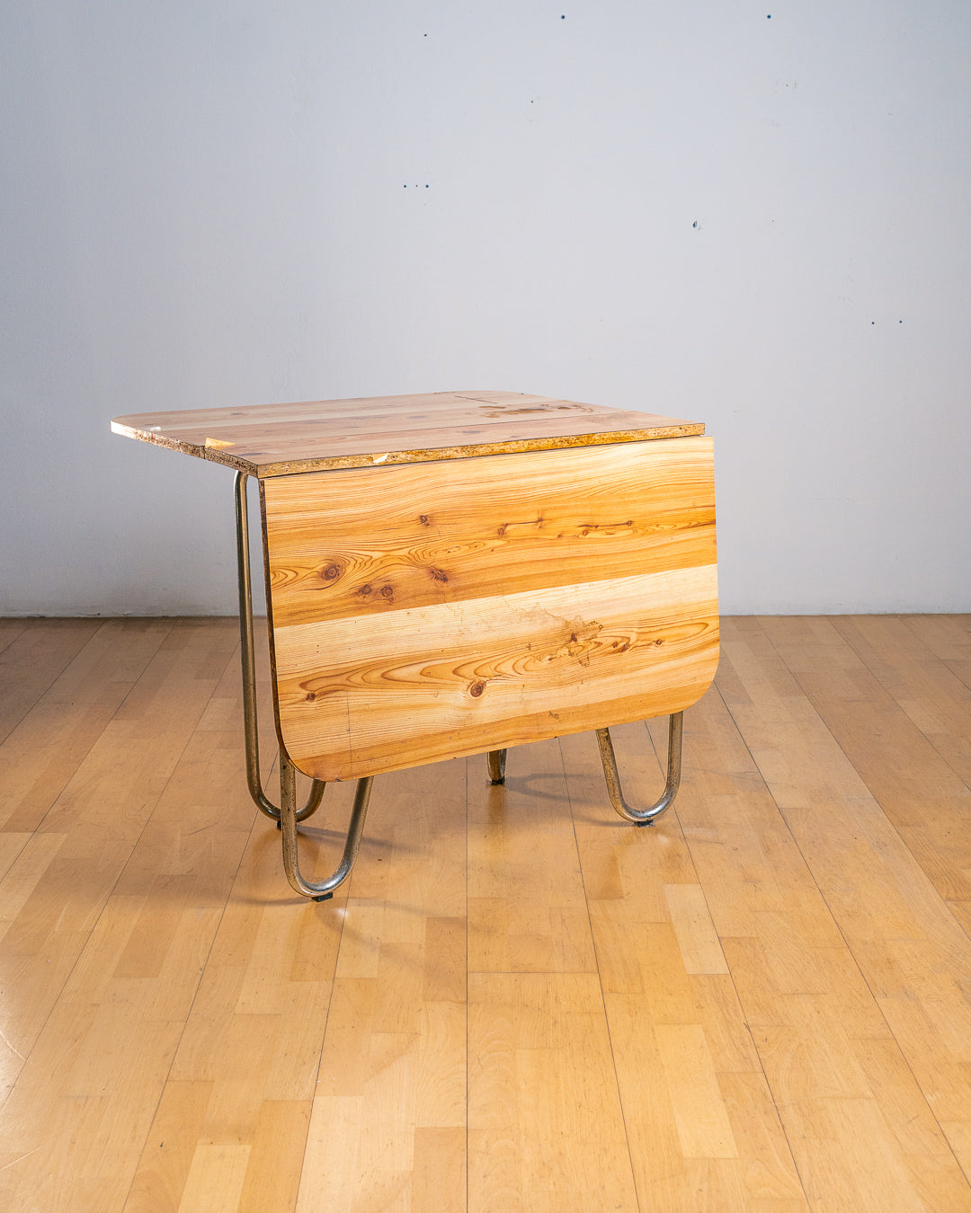 Vintage 1970s folding dining table with chrome tubular legs and a custom made Formica tabletop. Functional Space Age design. Vecino Shop
