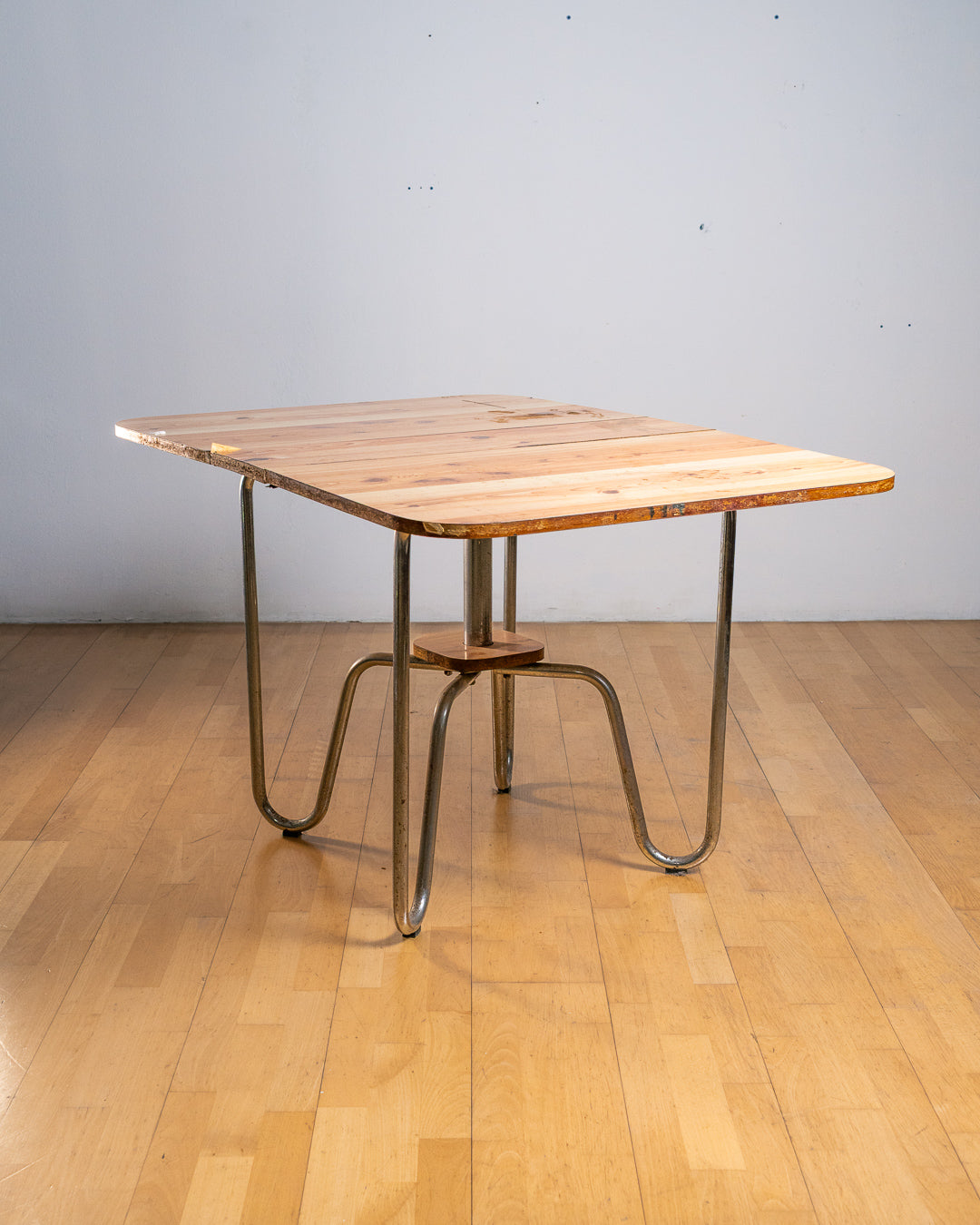 Vintage 1970s folding dining table with chrome tubular legs and a custom made Formica tabletop. Functional Space Age design. Vecino Shop