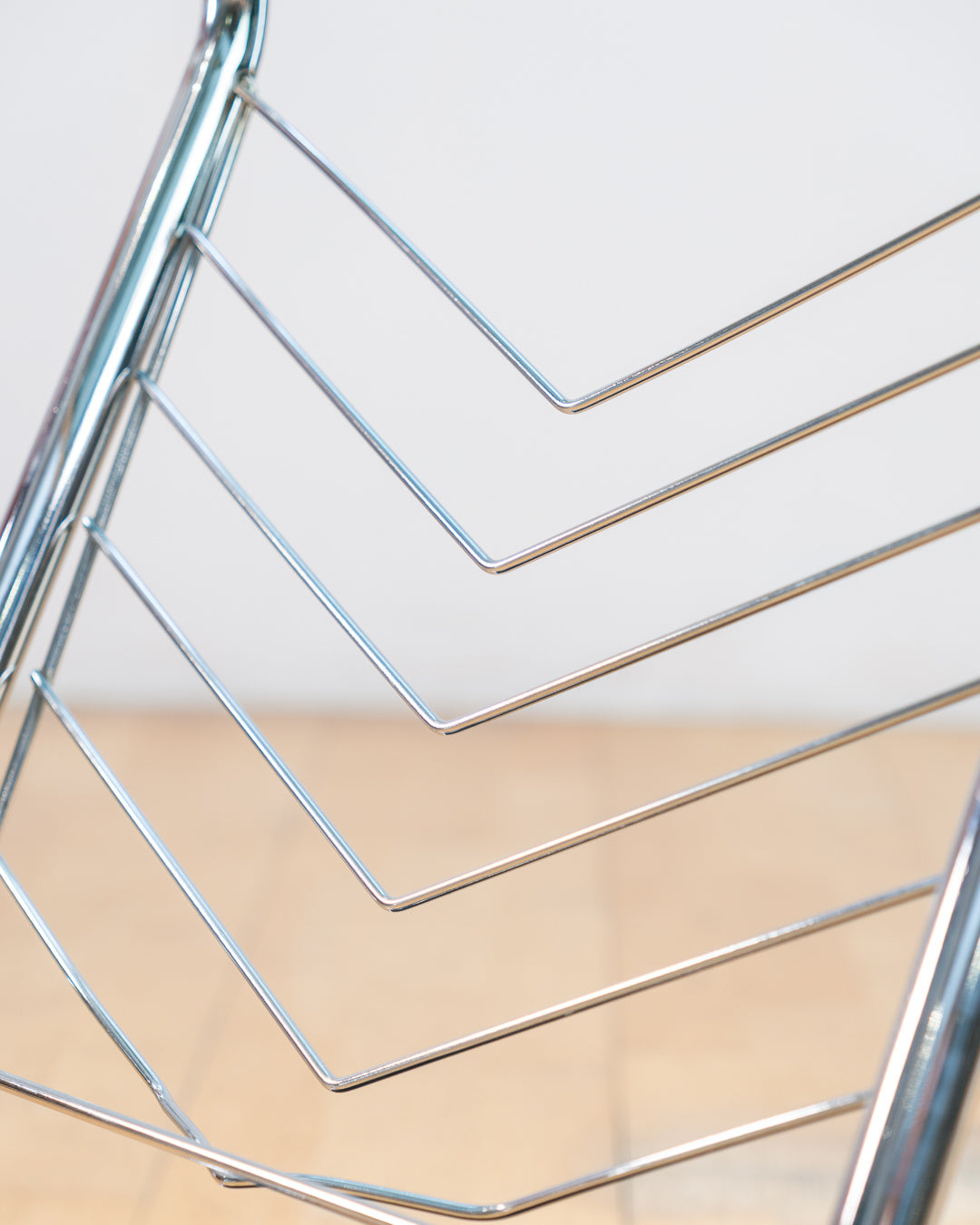 Vintage 1970s chrome side table with smoked glass top, black melamine shelf and integrated magazine rack. Vecino Shop