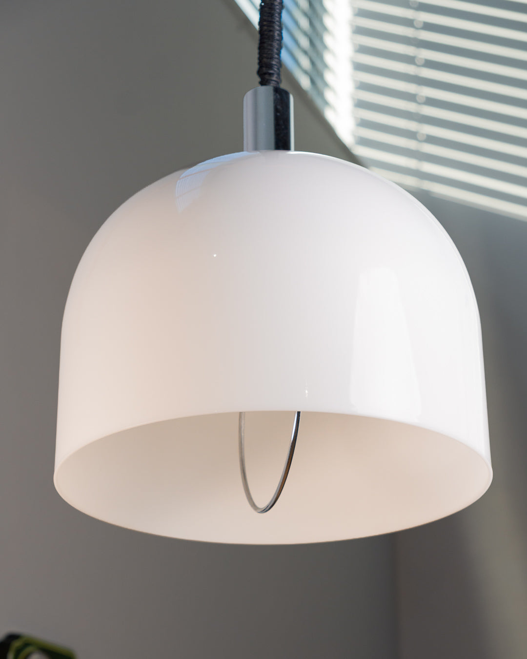 Vintage 1970s white acrylic dome extendable pendant lamp with chrome accents and adjustable coil, Space Age design. Vecino Shop