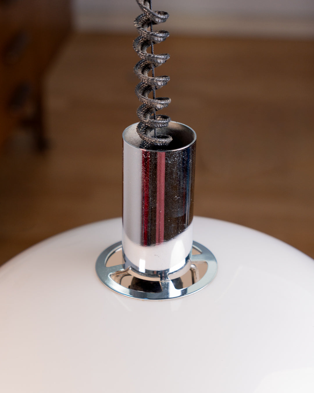 Vintage 1970s white acrylic dome extendable pendant lamp with chrome accents and adjustable coil, Space Age design. Vecino Shop