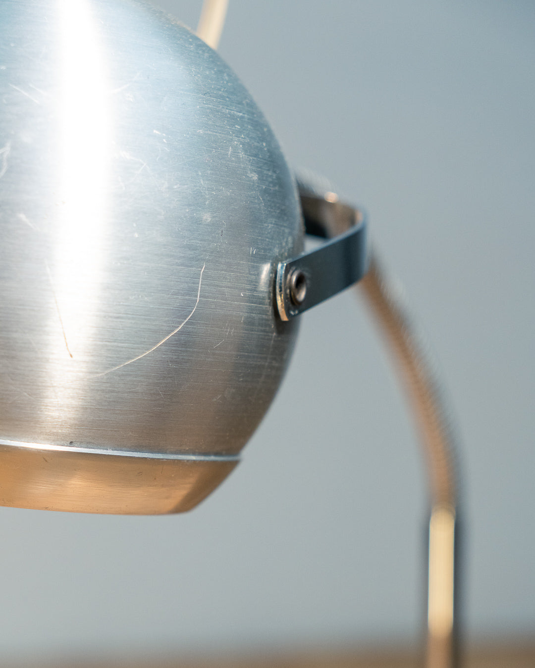 Vintage 1970s Aluminor eyeball clamp lamp with chrome shade, brushed steel finish, and flexible gooseneck. Made in France.