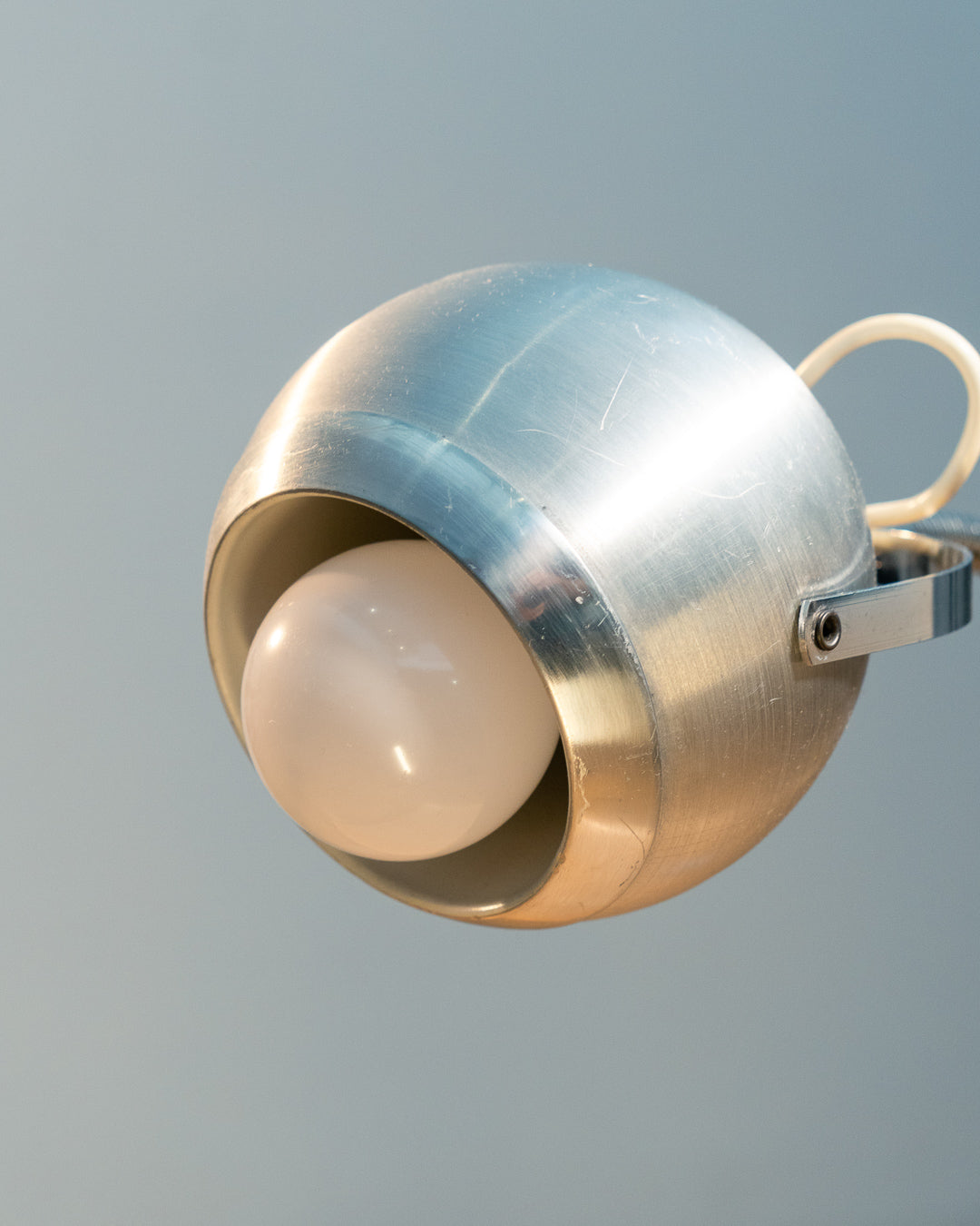 Vintage 1970s Aluminor eyeball clamp lamp with chrome shade, brushed steel finish, and flexible gooseneck. Made in France.