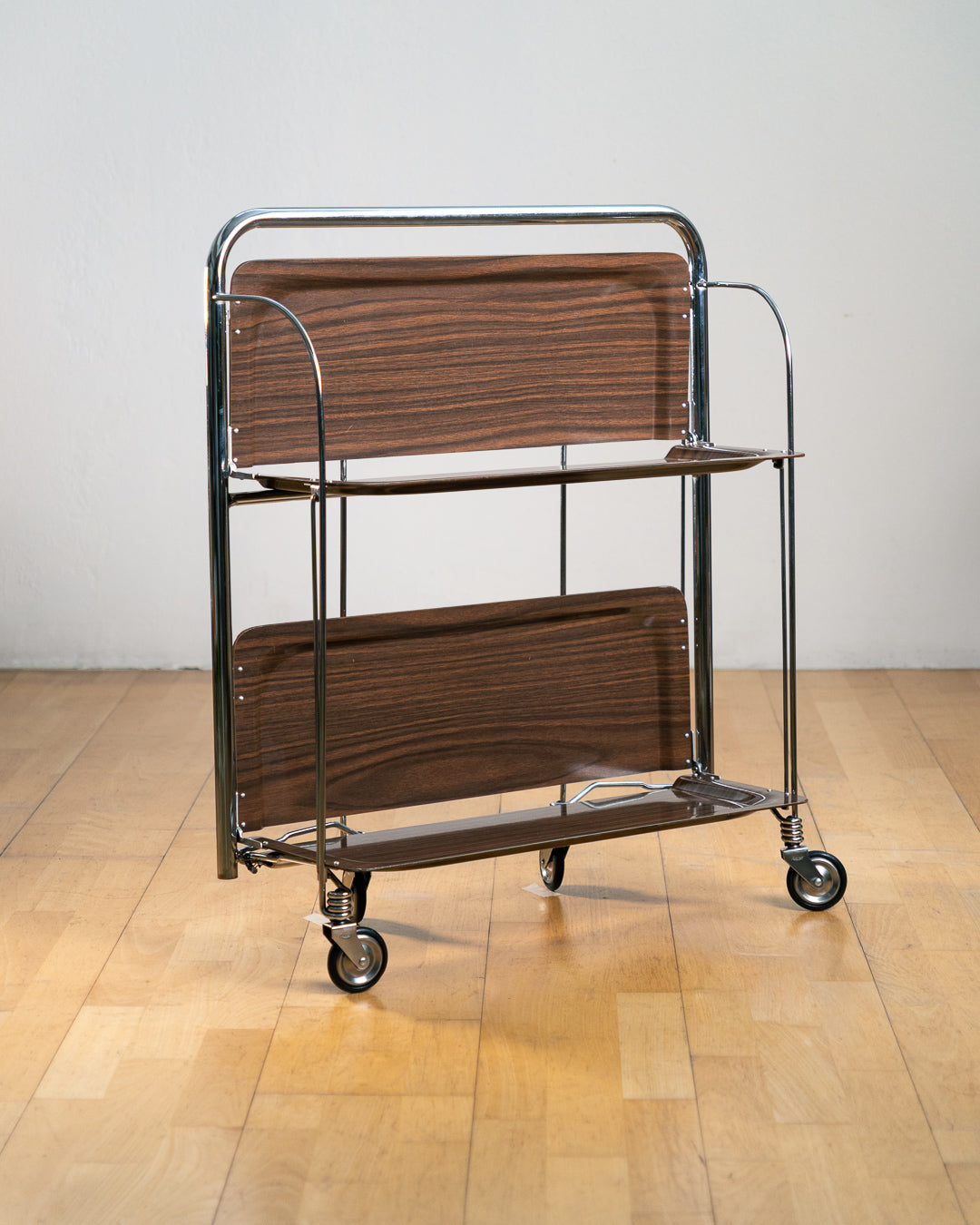 Vintage 1960s Raquer dark woodgrain folding trolley with  Formica shelves and chrome details. Bar Cart, drinks trolley. Mid Century Modern. Vecino Shop