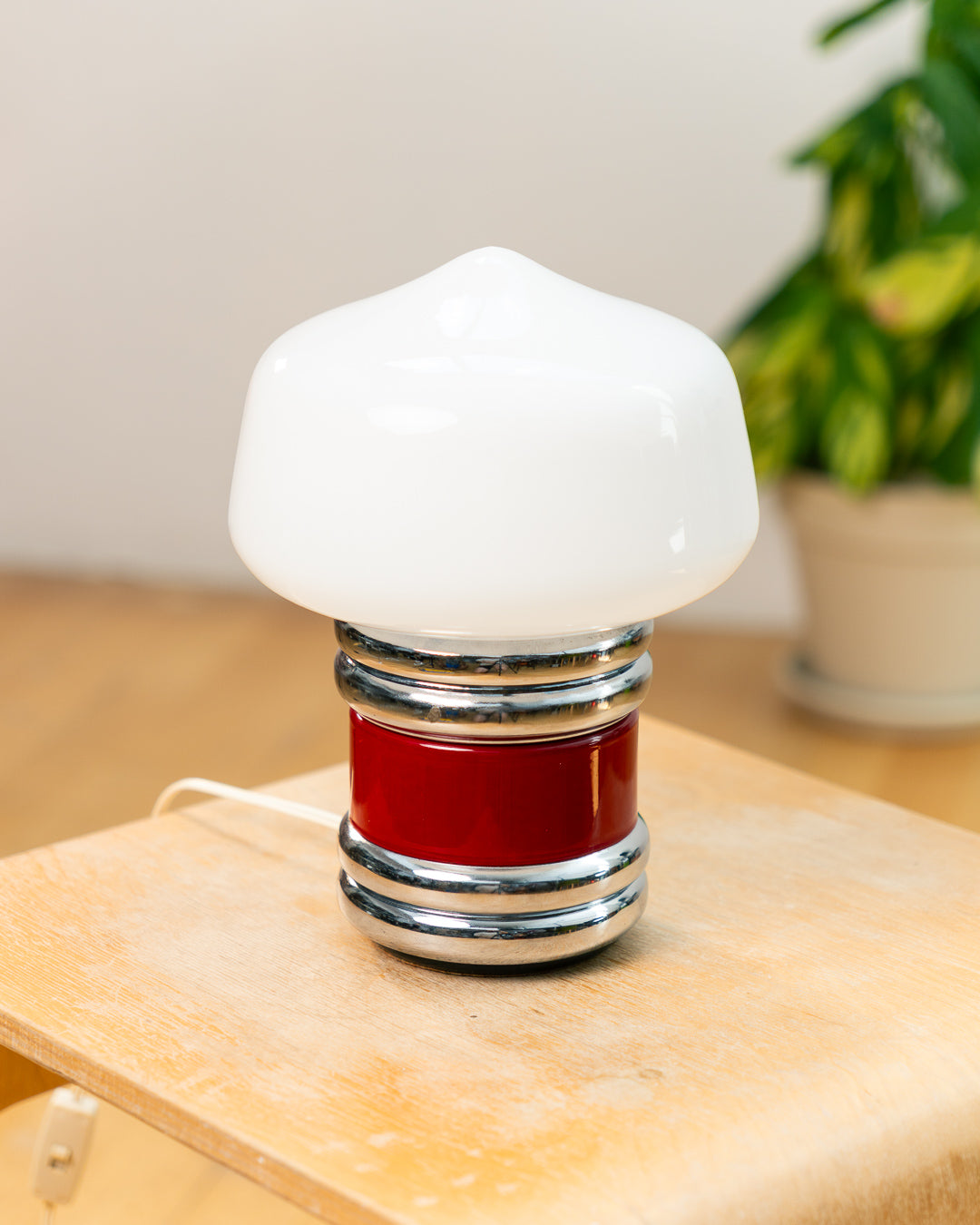 Vintage Space Age opaline mushroom desk lamp from the 1970s with chrome banded base and red enamel detail. Vecino Shop