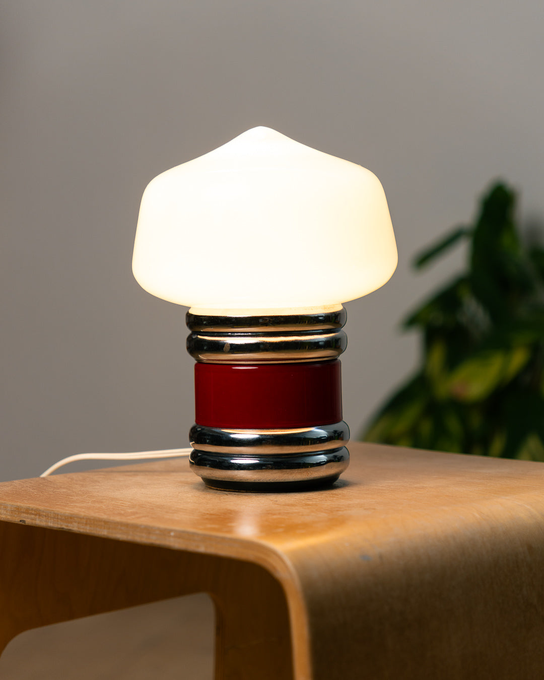 Vintage Space Age opaline mushroom desk lamp from the 1970s with chrome banded base and red enamel detail. Vecino Shop