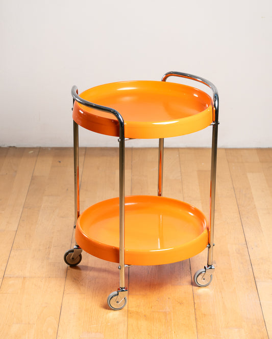 Vintage Italian chrome serving trolley with two orange plastic trays from the 1970s. Space Age bar cart design. Vecino Shop