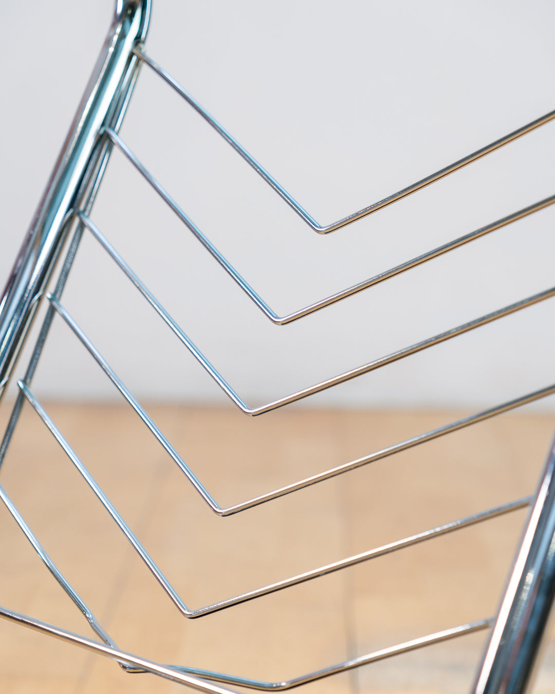 Vintage 1970s chrome side table with smoked glass top, black melamine shelf and integrated magazine rack. Vecino Shop
