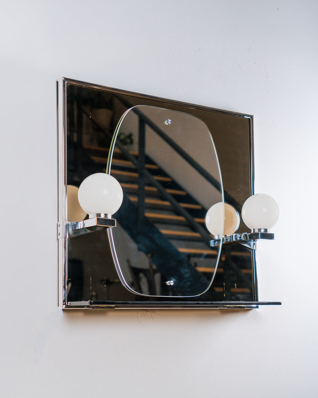 Vintage Space Age smoked black glass bathroom set from the 1970s with illuminated mirror, opaline globe sconces, shelf, acrylic towel holder and soap holder. Vecino Shop