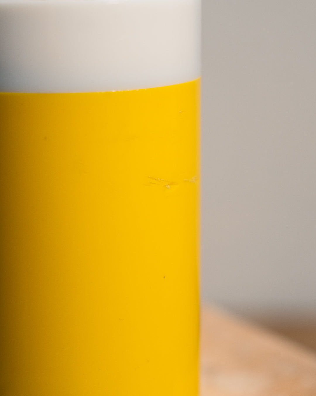 Vintage yellow folding pill-shaped table lamp from the 1970s with translucent glowing detail - night light ambient. Vecino Shop