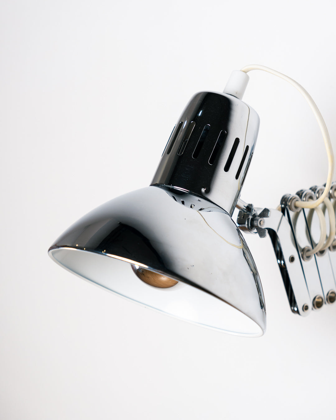 Vintage IKEA Semester chrome scissor wall lamp from the 1980s with extendable adjustable arm. Vecino Shop