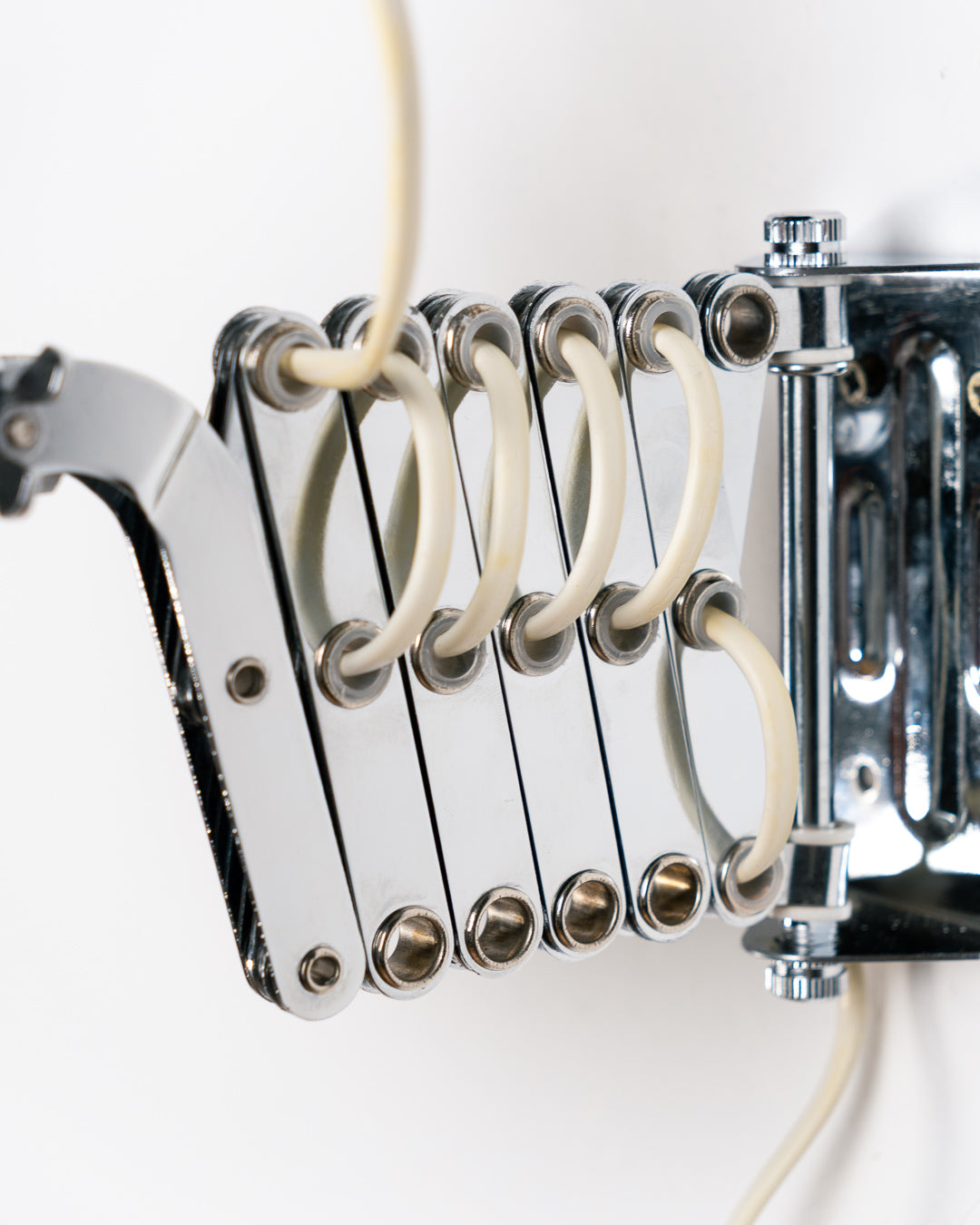 Vintage IKEA Semester chrome scissor wall lamp from the 1980s with extendable adjustable arm. Vecino Shop
