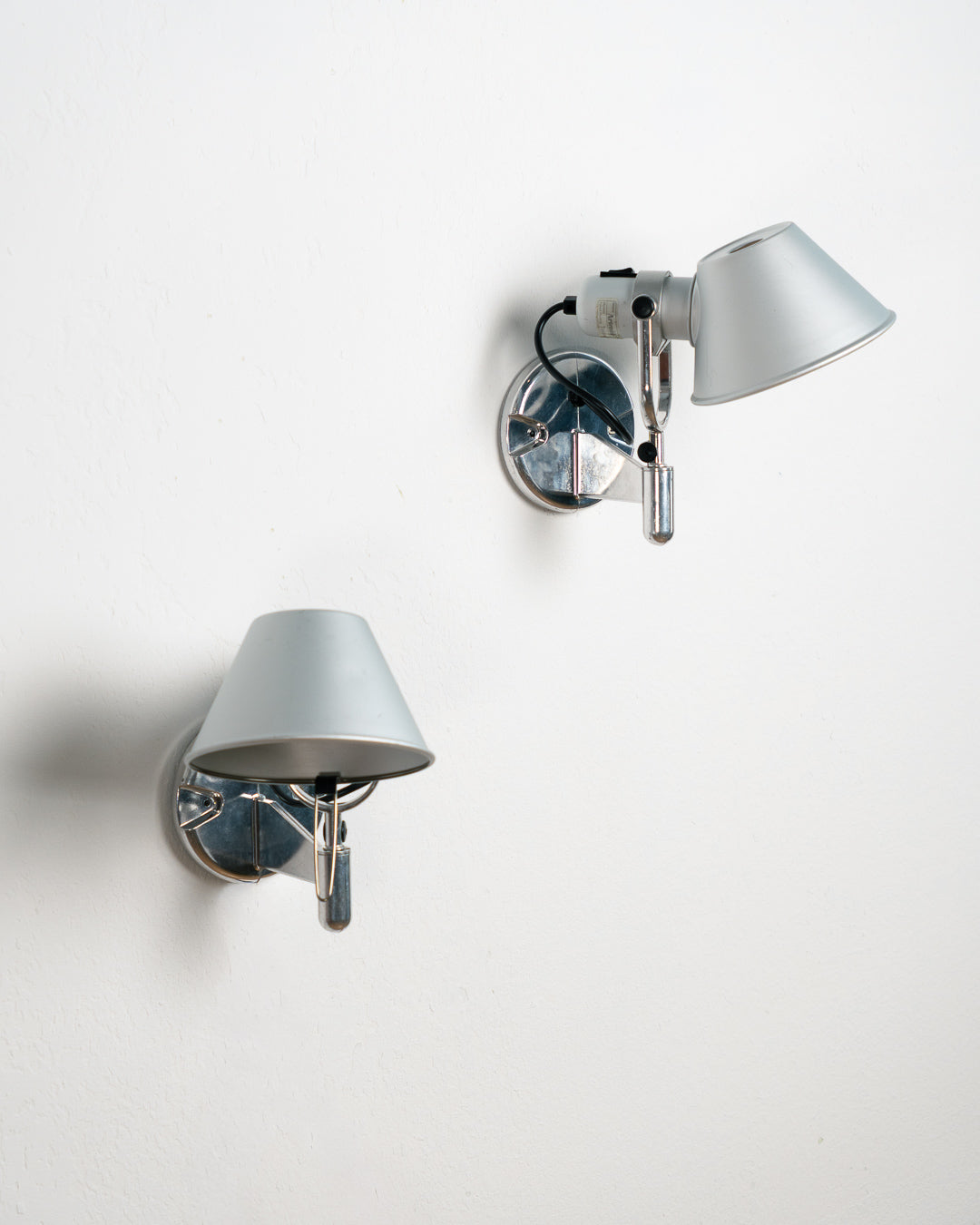 Vintage 1990s Artemide Tolomeo Faretto wall sconce in anodized aluminum with adjustable shade and integrated switch. Vecino Shop