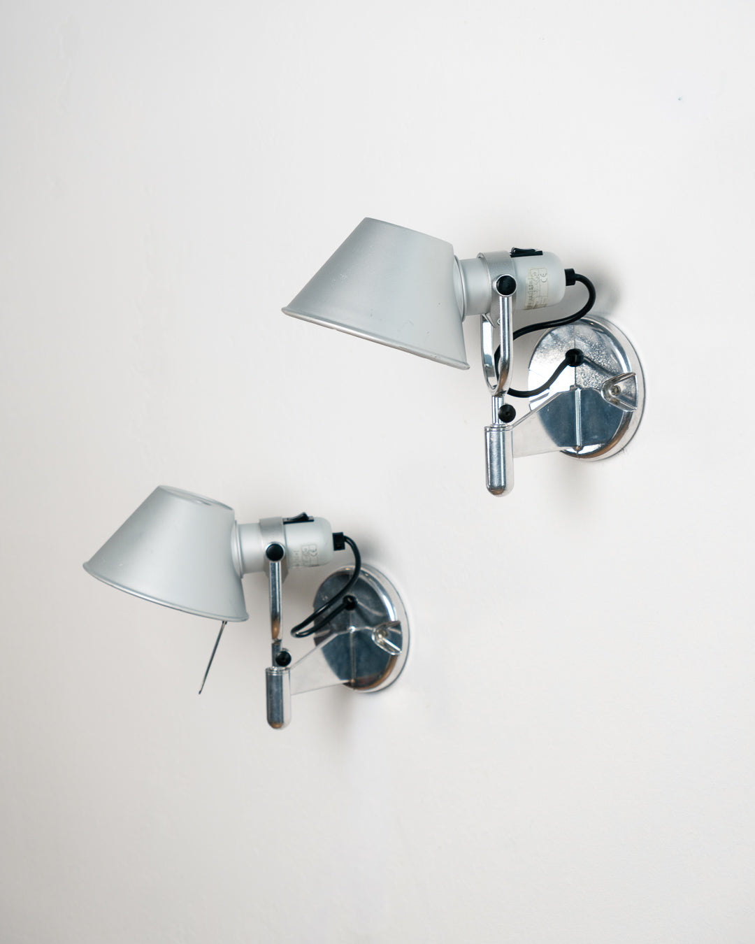 Vintage 1990s Artemide Tolomeo Faretto wall sconce in anodized aluminum with adjustable shade and integrated switch. Vecino Shop