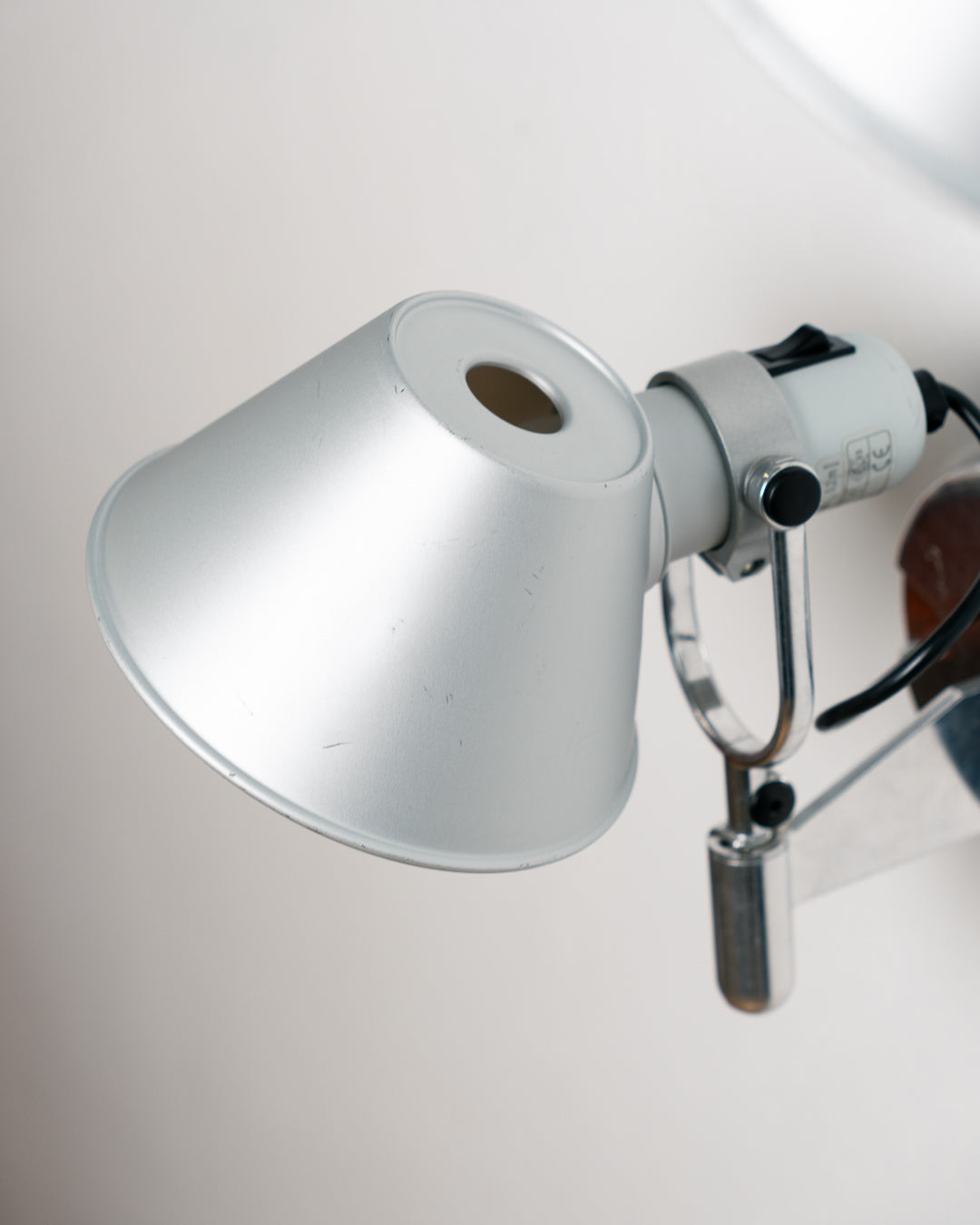 Vintage 1990s Artemide Tolomeo Faretto wall sconce in anodized aluminum with adjustable shade and integrated switch. Vecino Shop
