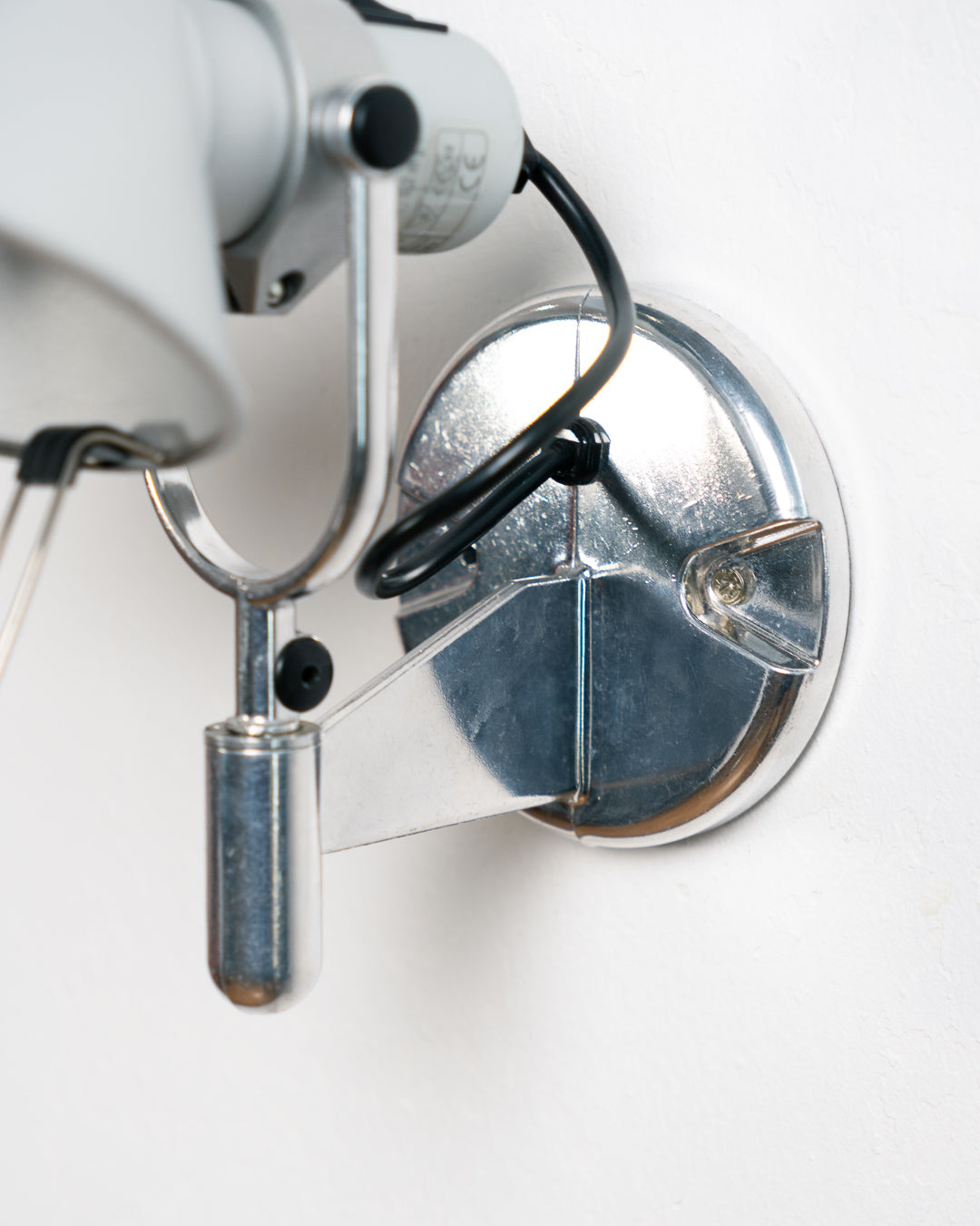 Vintage 1990s Artemide Tolomeo Faretto wall sconce in anodized aluminum with adjustable shade and integrated switch. Vecino Shop