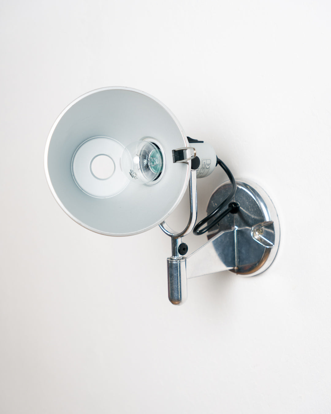 Vintage 1990s Artemide Tolomeo Faretto wall sconce in anodized aluminum with adjustable shade and integrated switch. Vecino Shop