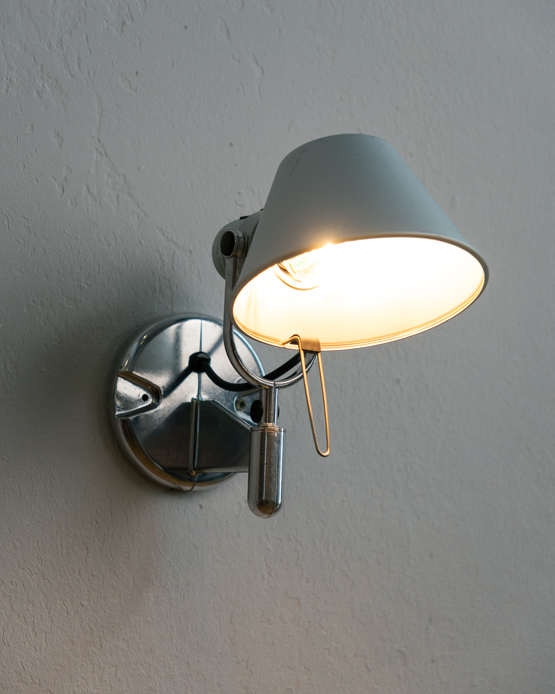 Vintage 1990s Artemide Tolomeo Faretto wall sconce in anodized aluminum with adjustable shade and integrated switch. Vecino Shop