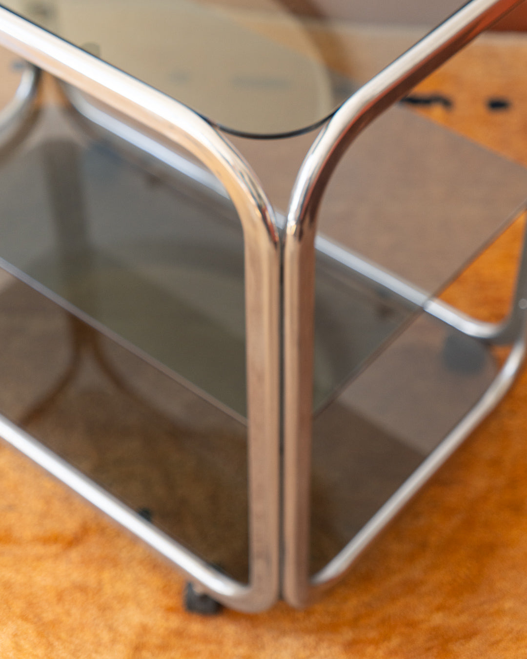 Vintage 1970s chrome and smoked glass 3-tier side table with flattened tubular frame – Vecino Shop