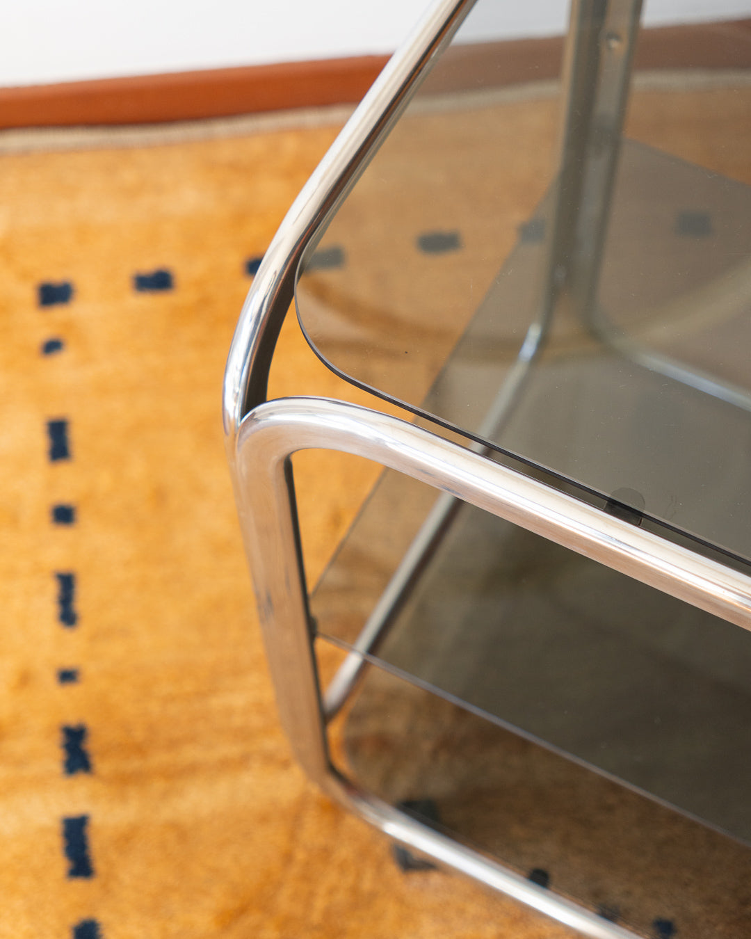 Vintage 1970s chrome and smoked glass 3-tier side table with flattened tubular frame – Vecino Shop