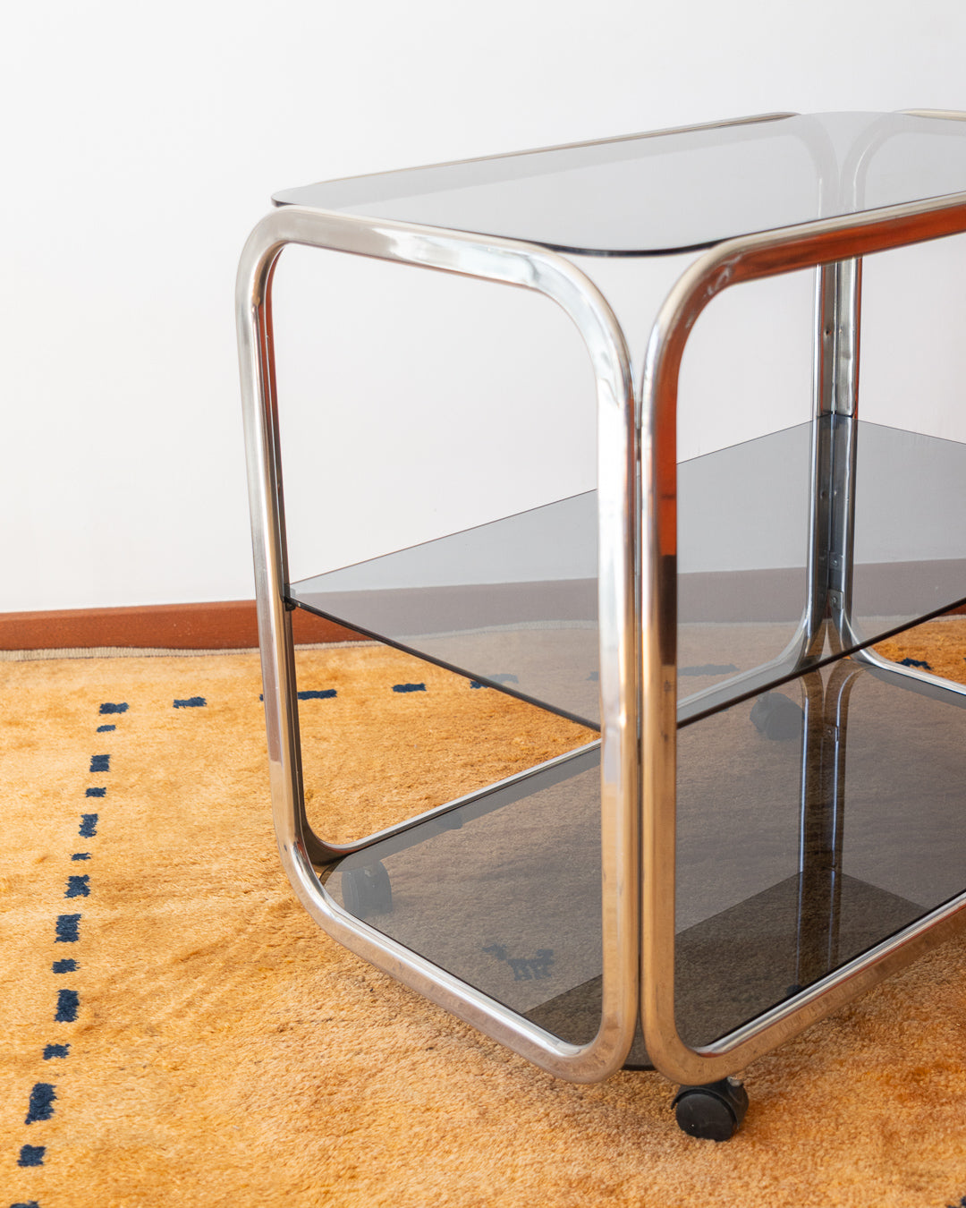 Vintage 1970s chrome and smoked glass 3-tier side table with flattened tubular frame – Vecino Shop