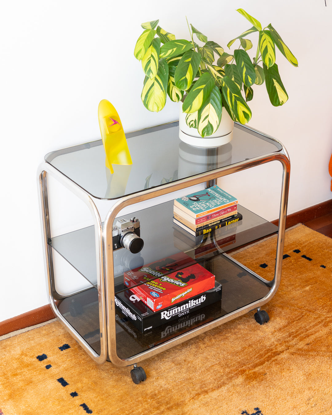 Vintage 1970s chrome and smoked glass 3-tier side table with flattened tubular frame – Vecino Shop